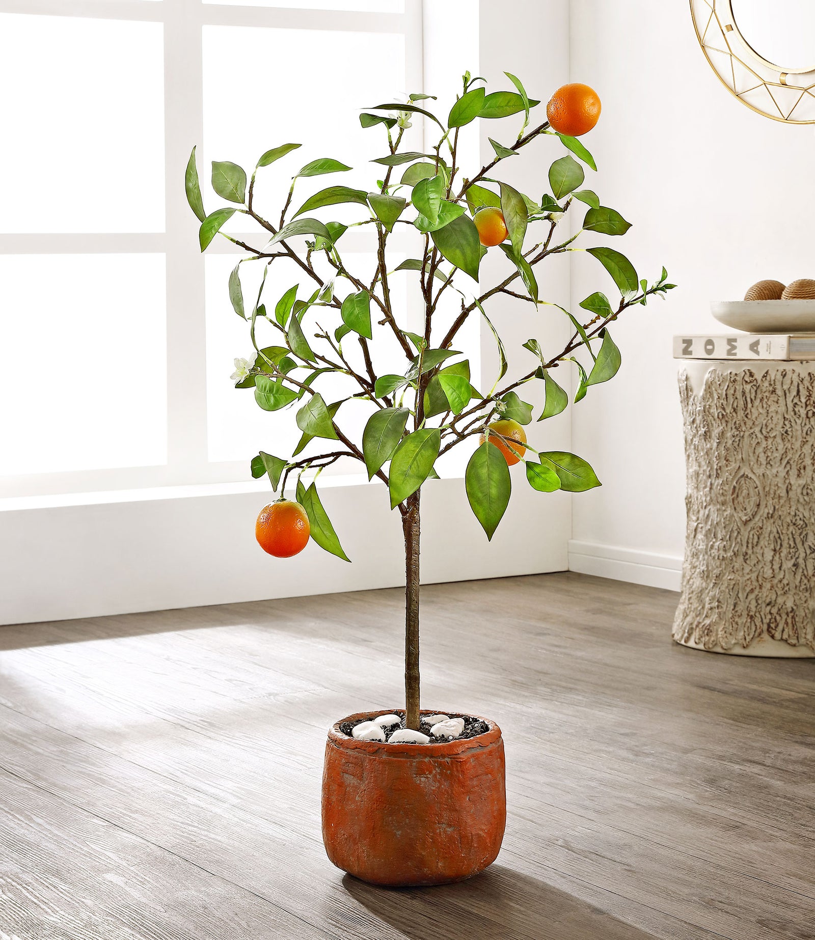 Bright oranges and green leaves enliven a light-filled room. || FXP1004A || front_room