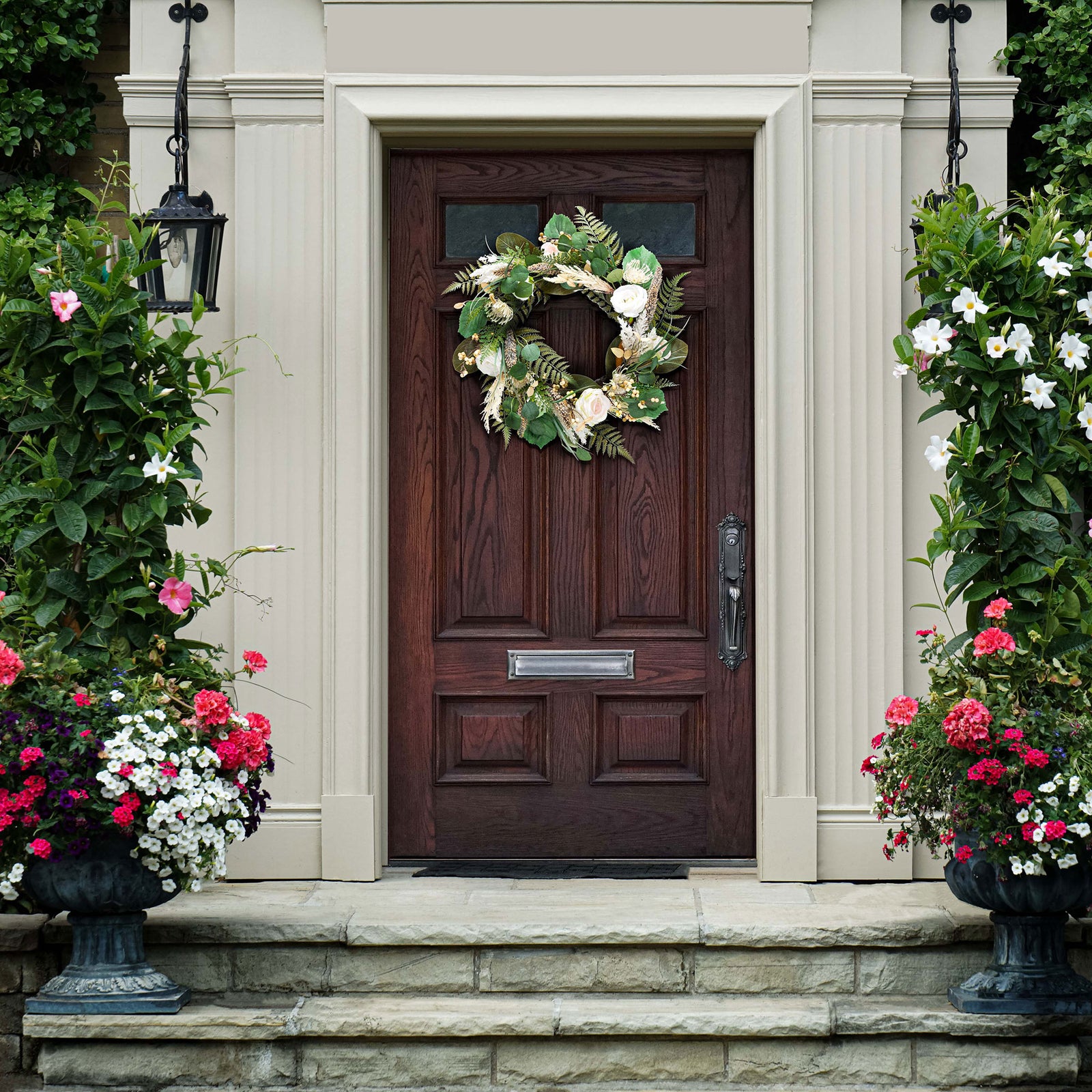 A rose and fern wreath freshens a welcoming entryway. || FXP1023A || front_room