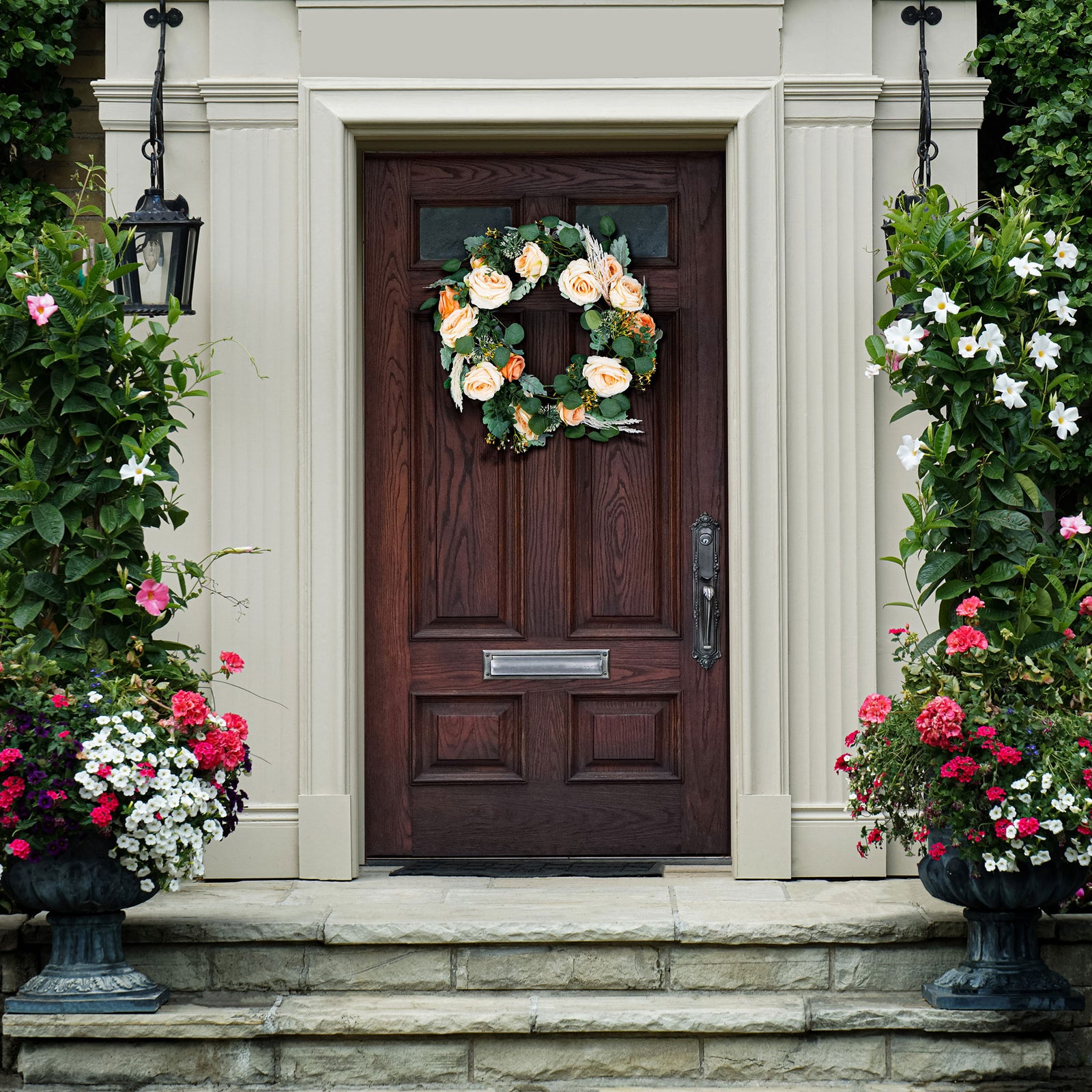 A rose and eucalyptus wreath adds a welcoming touch to the entryway. || FXP1024A || front_room