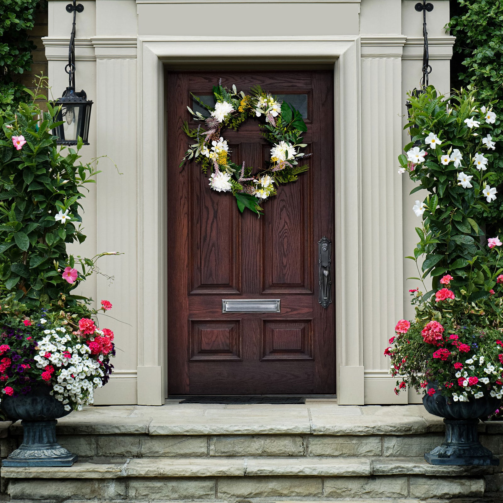 A white floral wreath lends a fresh seasonal touch to the entryway. || FXP1028A || front_room