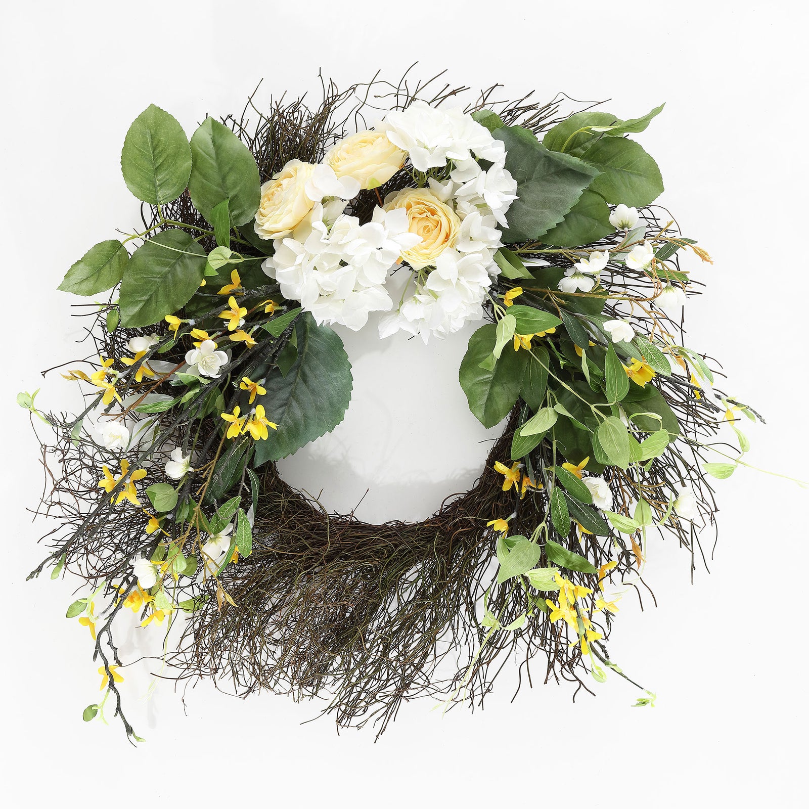 White hydrangeas, soft cream flowers, and yellow blossoms crown a twig wreath. || FXP1039A || front_studio
