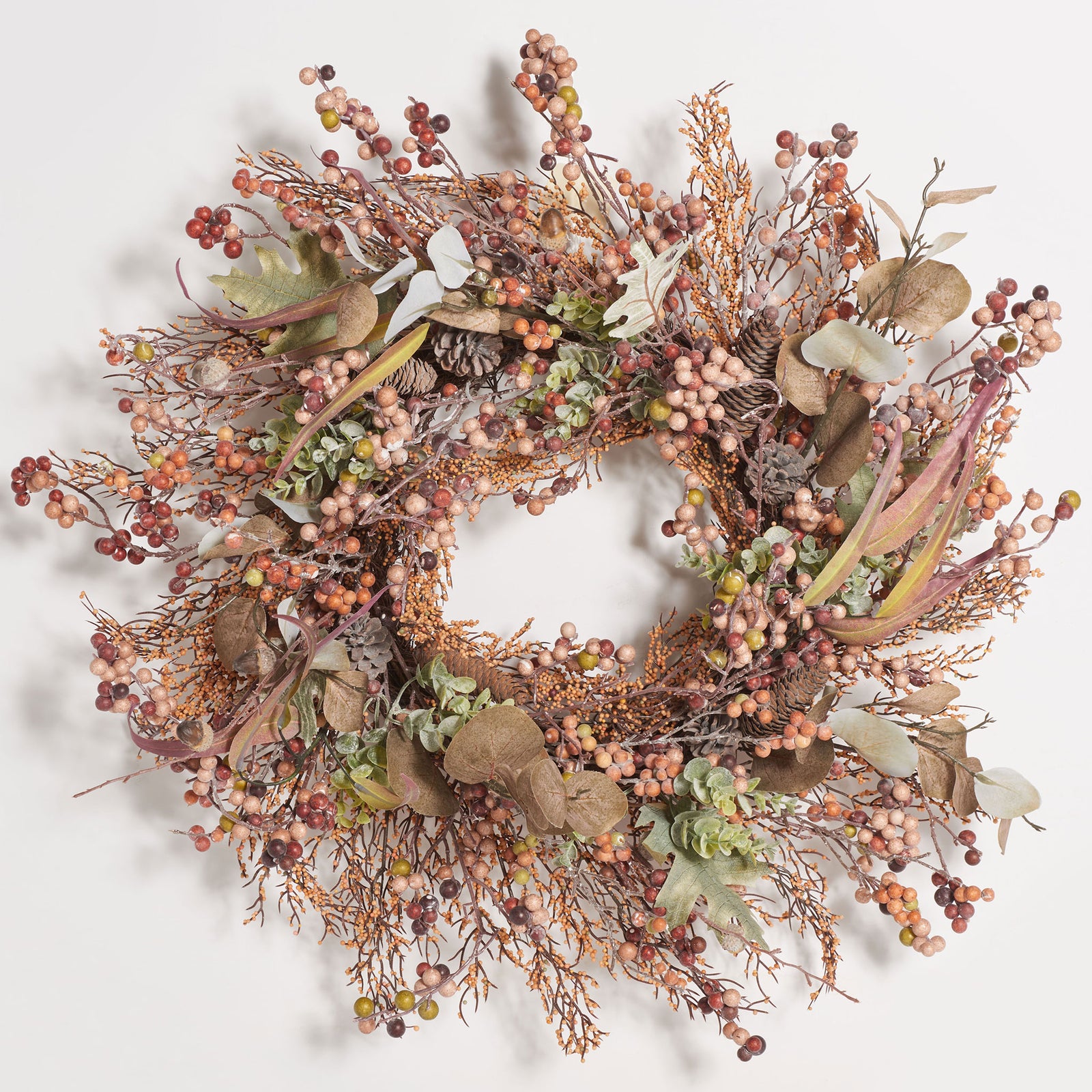 Earth-toned berries and acorns give this leafy wreath a natural harvest look. || FXP1043A || front_studio