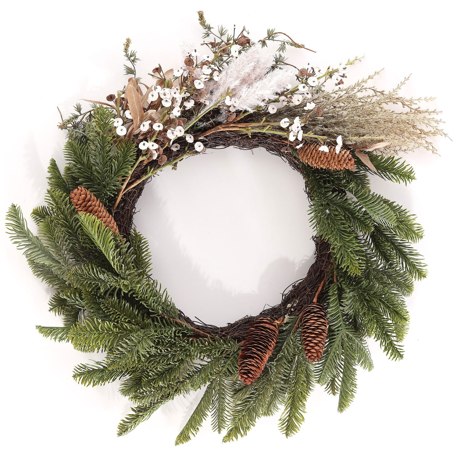 Green pine boughs balance airy white blossoms and hanging pine cones. || FXP1095A || front_studio
