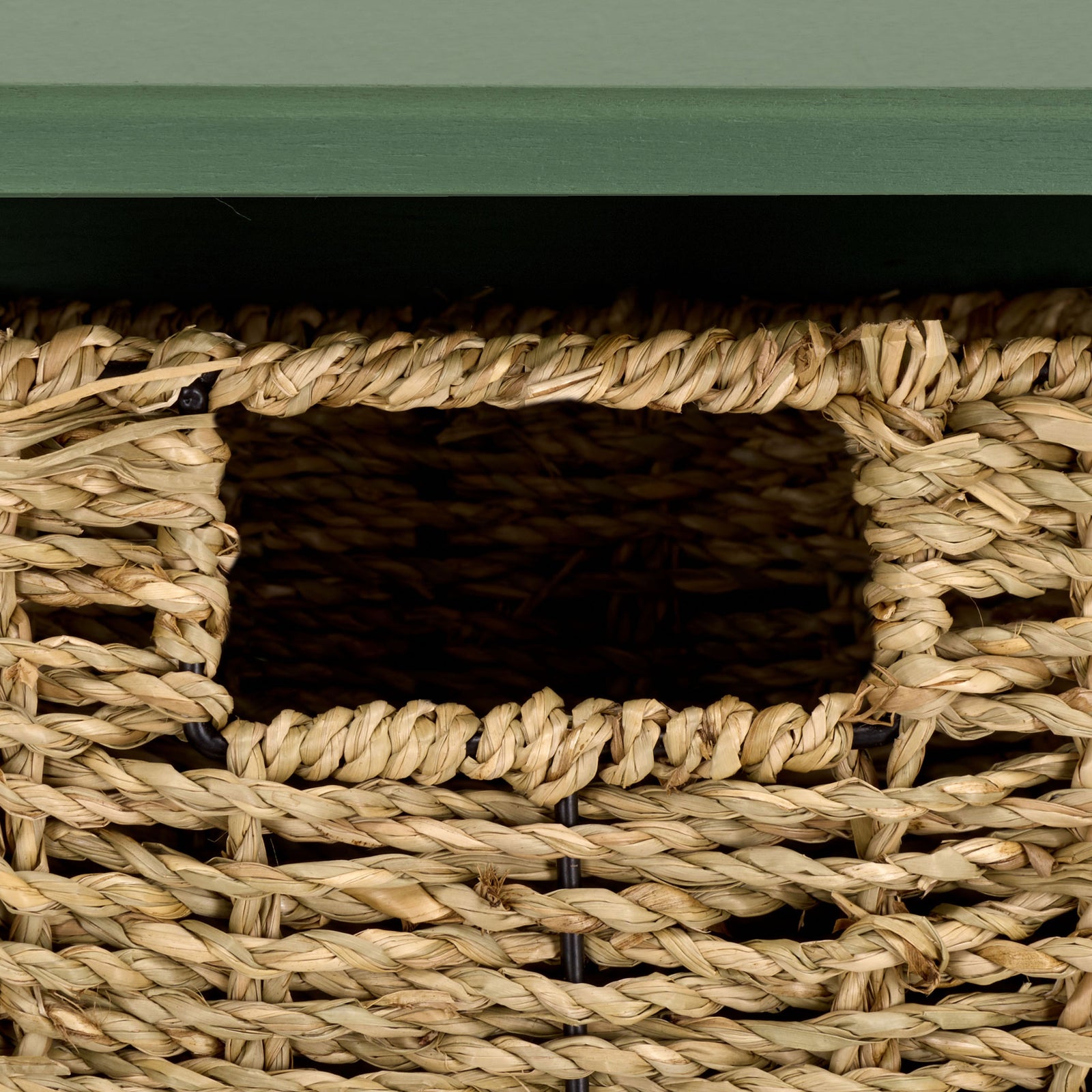 A woven basket's inset grip allows easy access to storage within the green frame || HAC5700G || handle_studio