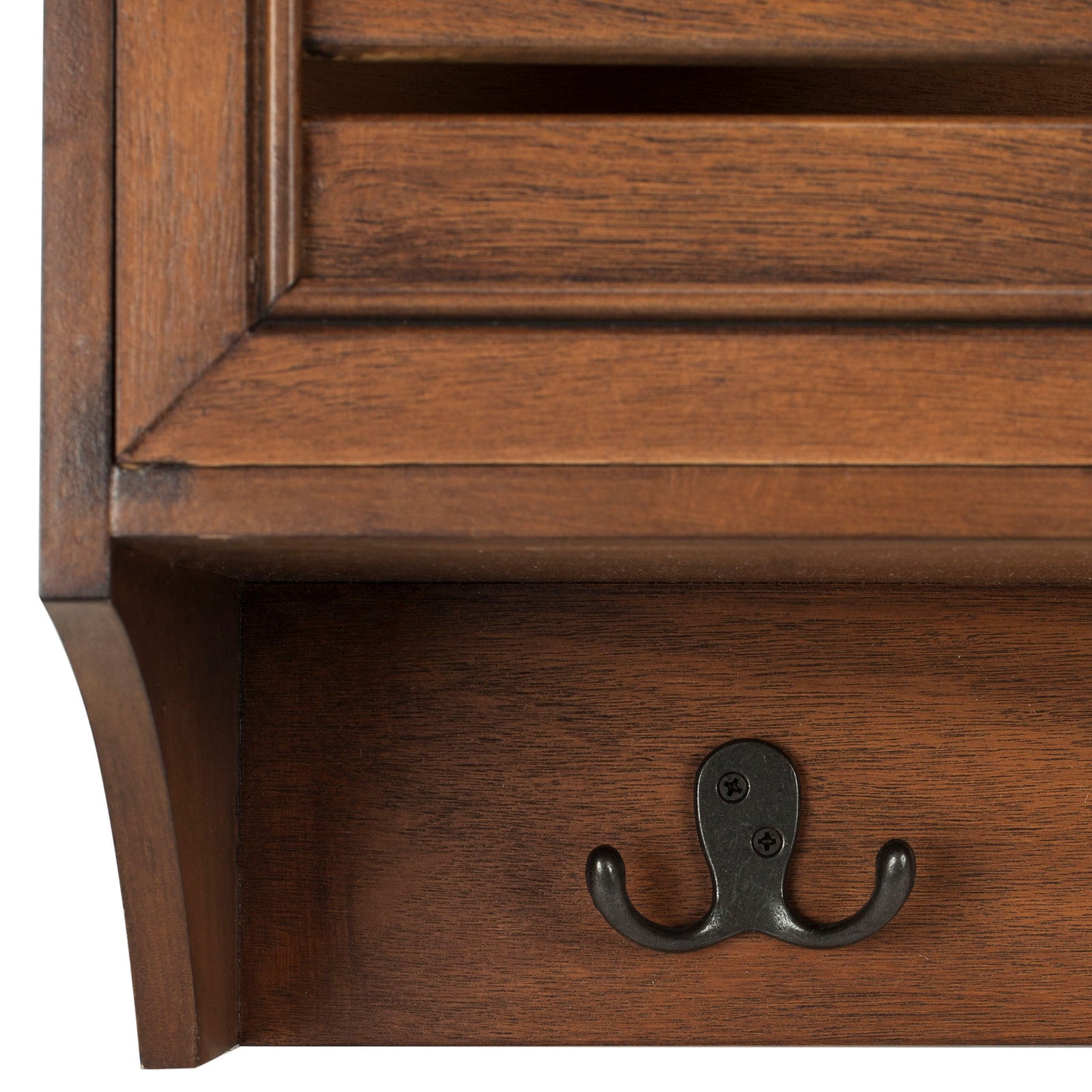 A dark metal double hook offers a convenient spot for coats and keys beneath the framed wood drawers. || HAC5701B || detail_studio