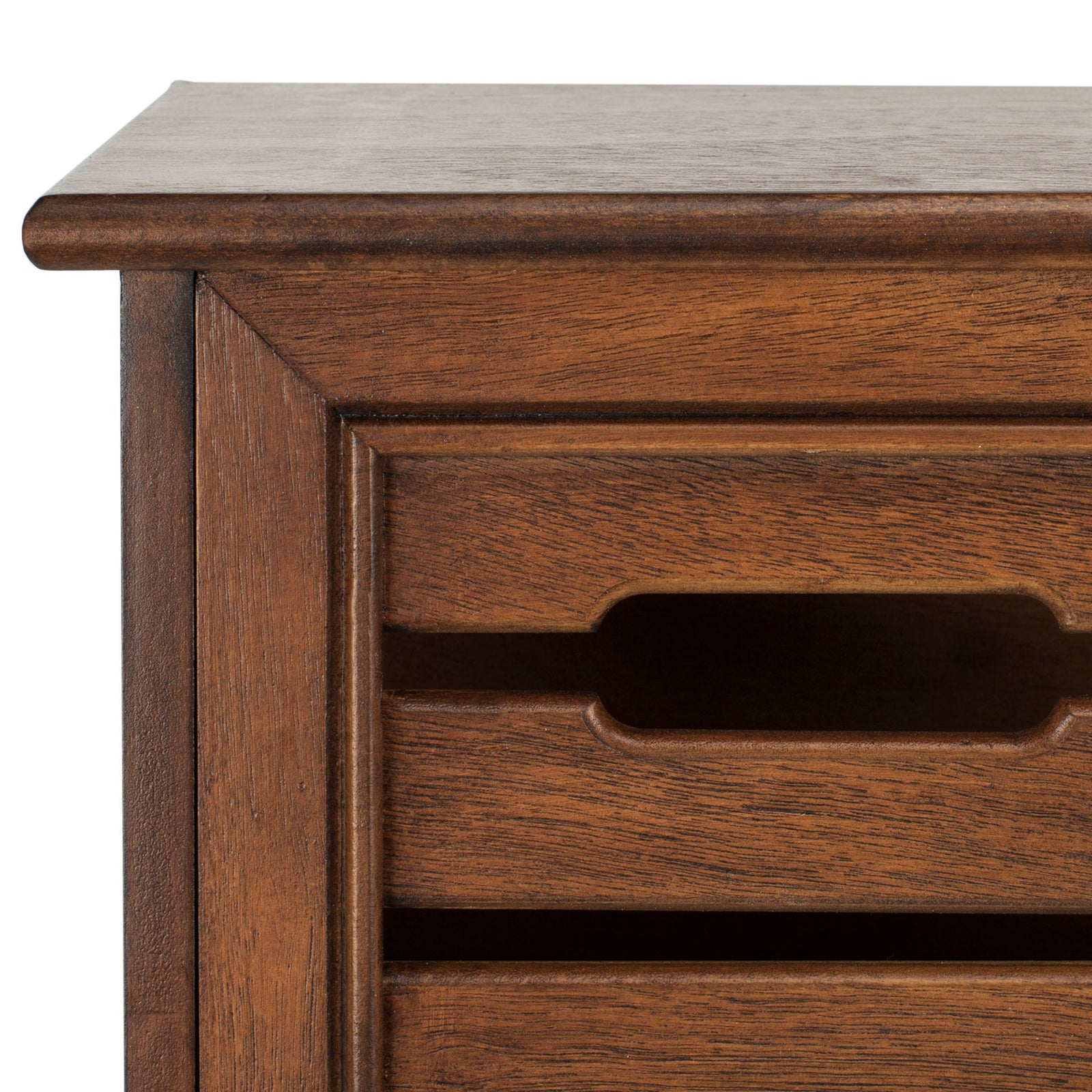 A recessed finger pull highlights the wood grain and raised trim of a warm brown storage drawer. || HAC5701B || handle_studio
