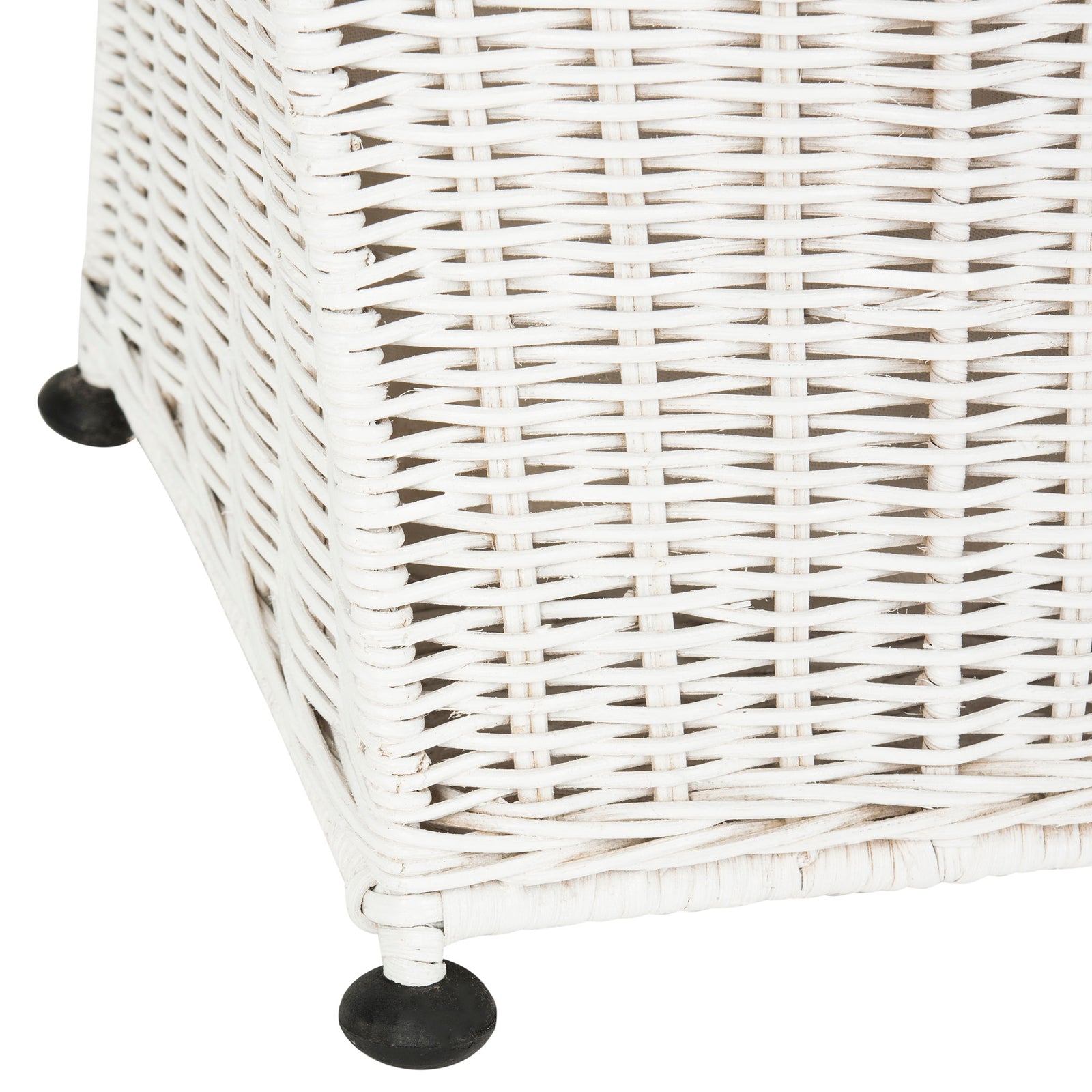 A woven white base rises above round black feet on this rattan laundry basket. || HAC6002A || leg_studio
