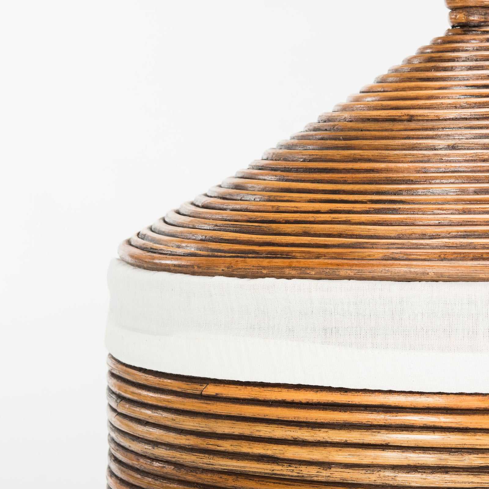 Honey-brown rattan wraps the tapered lid above a crisp band of white fabric || HAC6501C || detail_studio