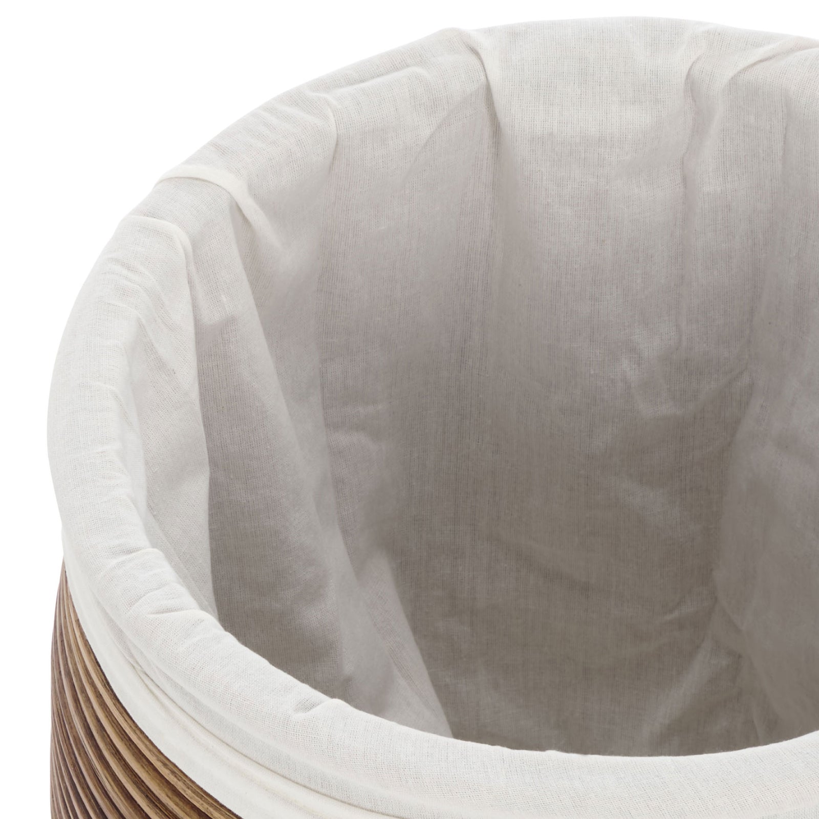 A soft white fabric liner folds over the rim of the open laundry compartment || HAC6503A || storage_open_studio