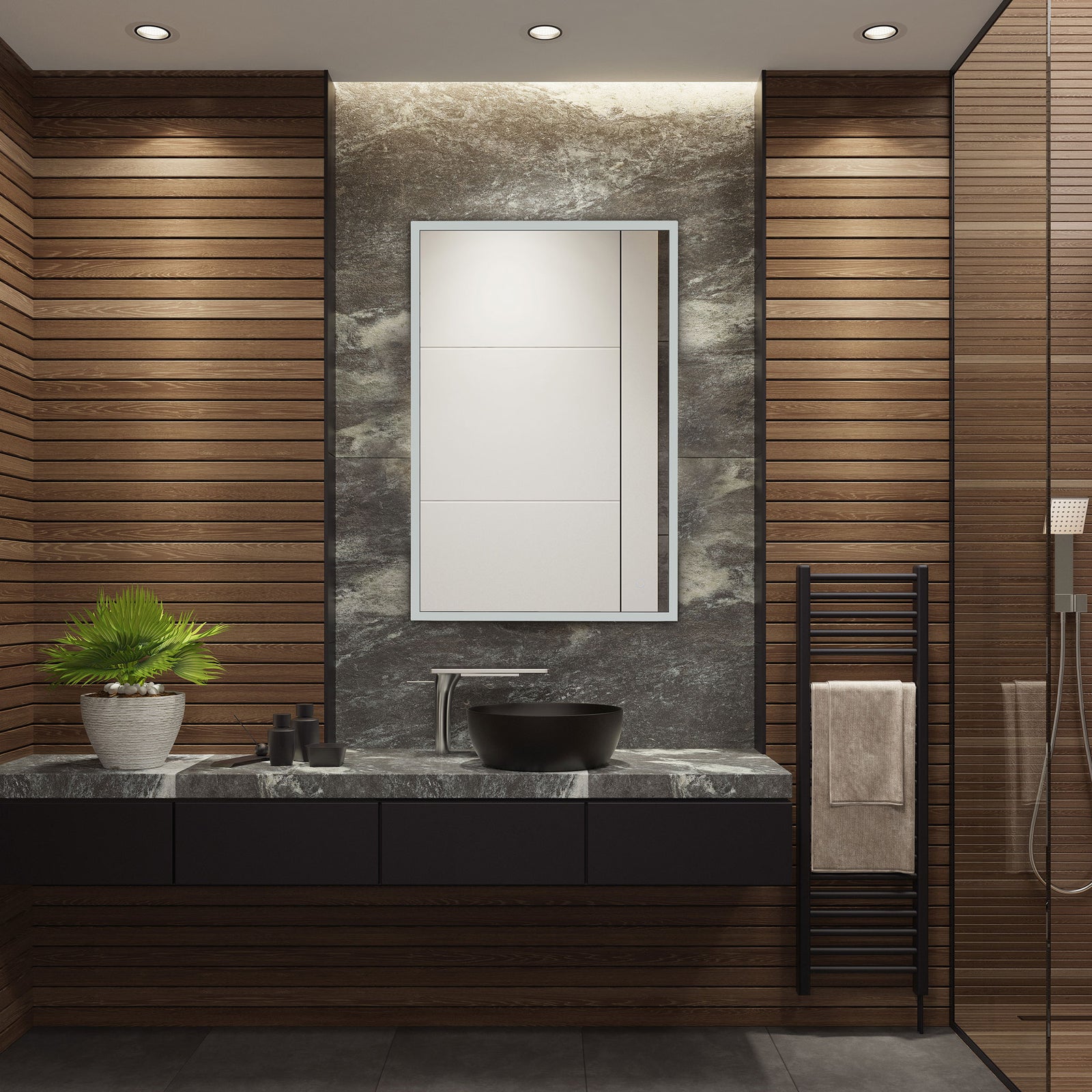 A slim silver-framed mirror adds clean lines above a stone vanity and black vessel sink. || LMR1003A || front_room