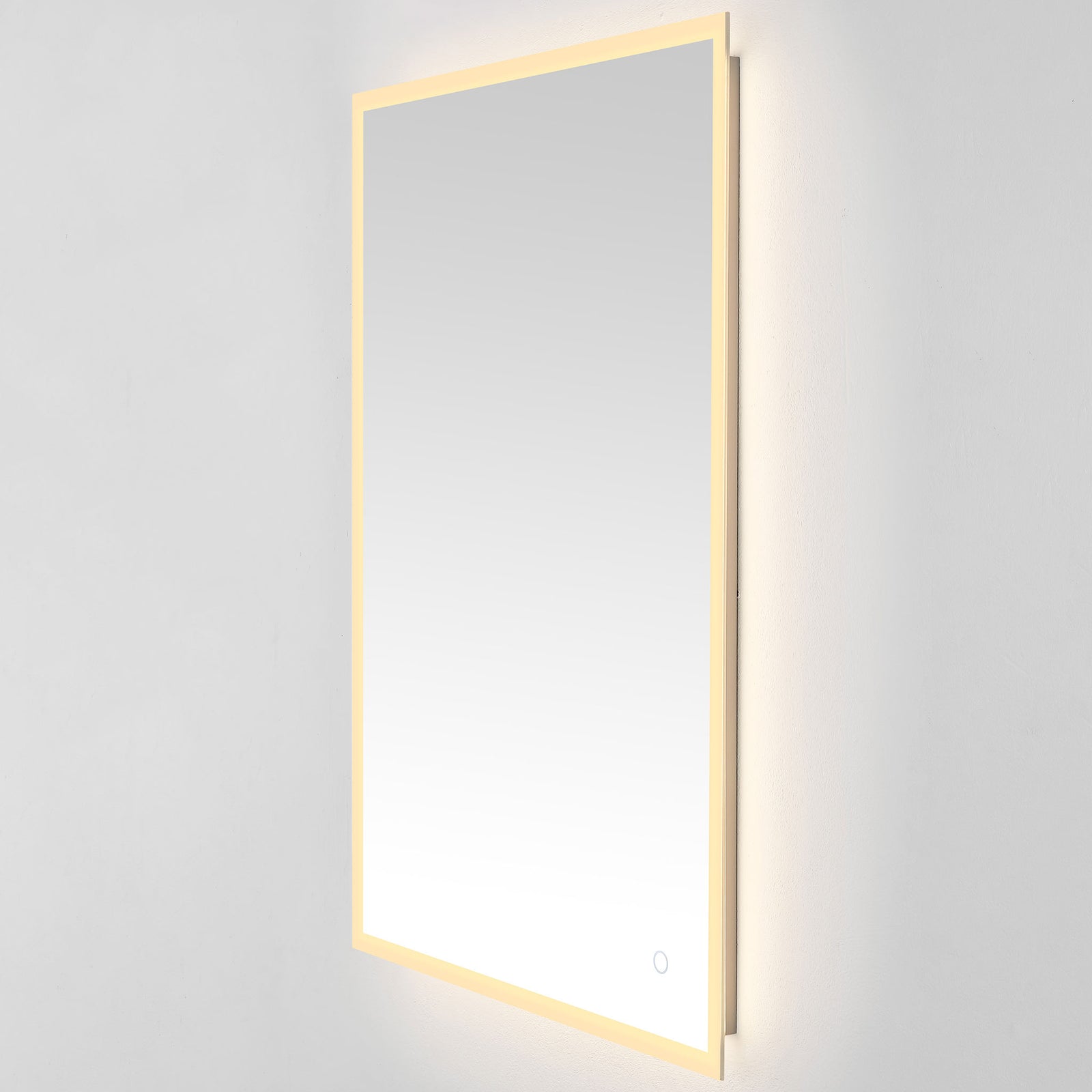 Warm golden light traces the tall mirror's border above a discreet touch button. || LMR1003A || front_angle_on_studio