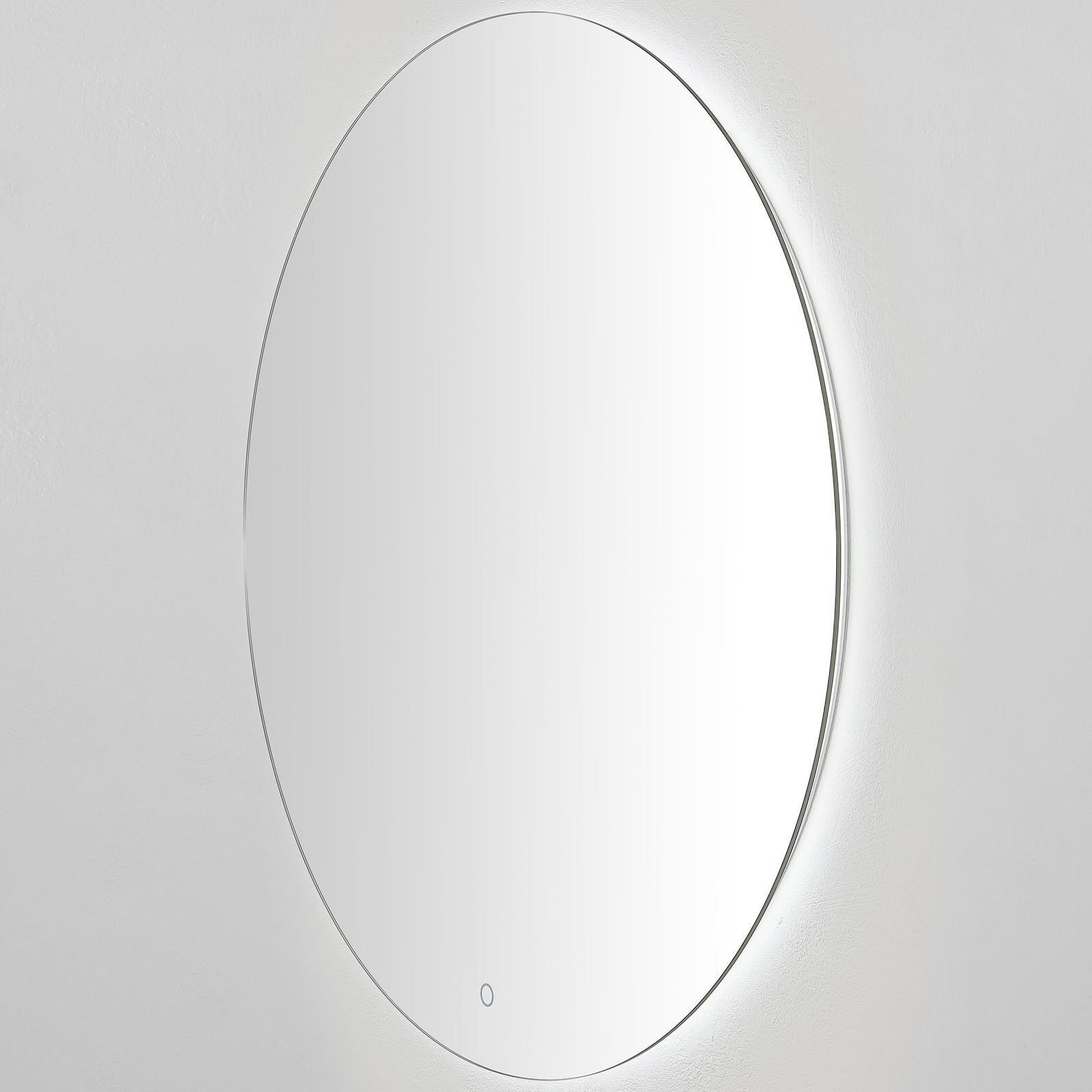 A slim circular mirror glows softly with white LED light behind its silver edge. || LMR1004A || side_on_studio