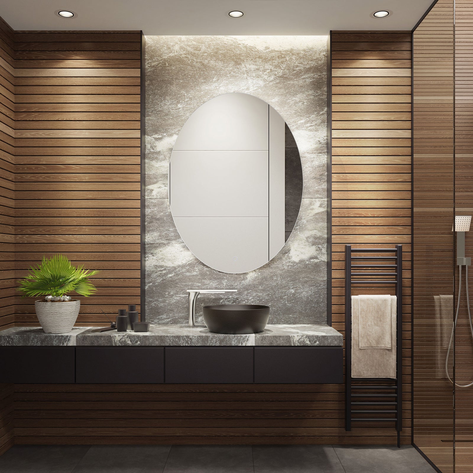 LED backlighting creates a gentle halo behind the oval mirror above a modern bathroom vanity || LMR1005A || front_on_room