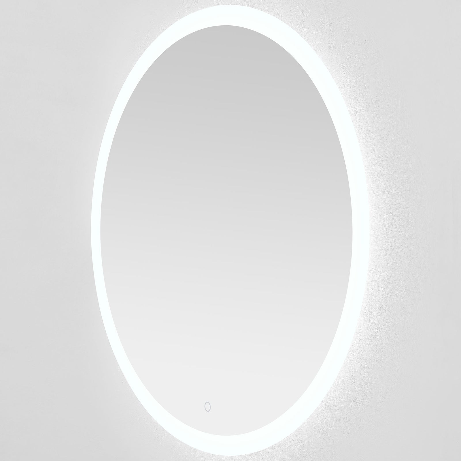 Crisp white perimeter lighting casts a soft halo around the silver-edged mirror. || LMR1008A || front_angle_on_studio