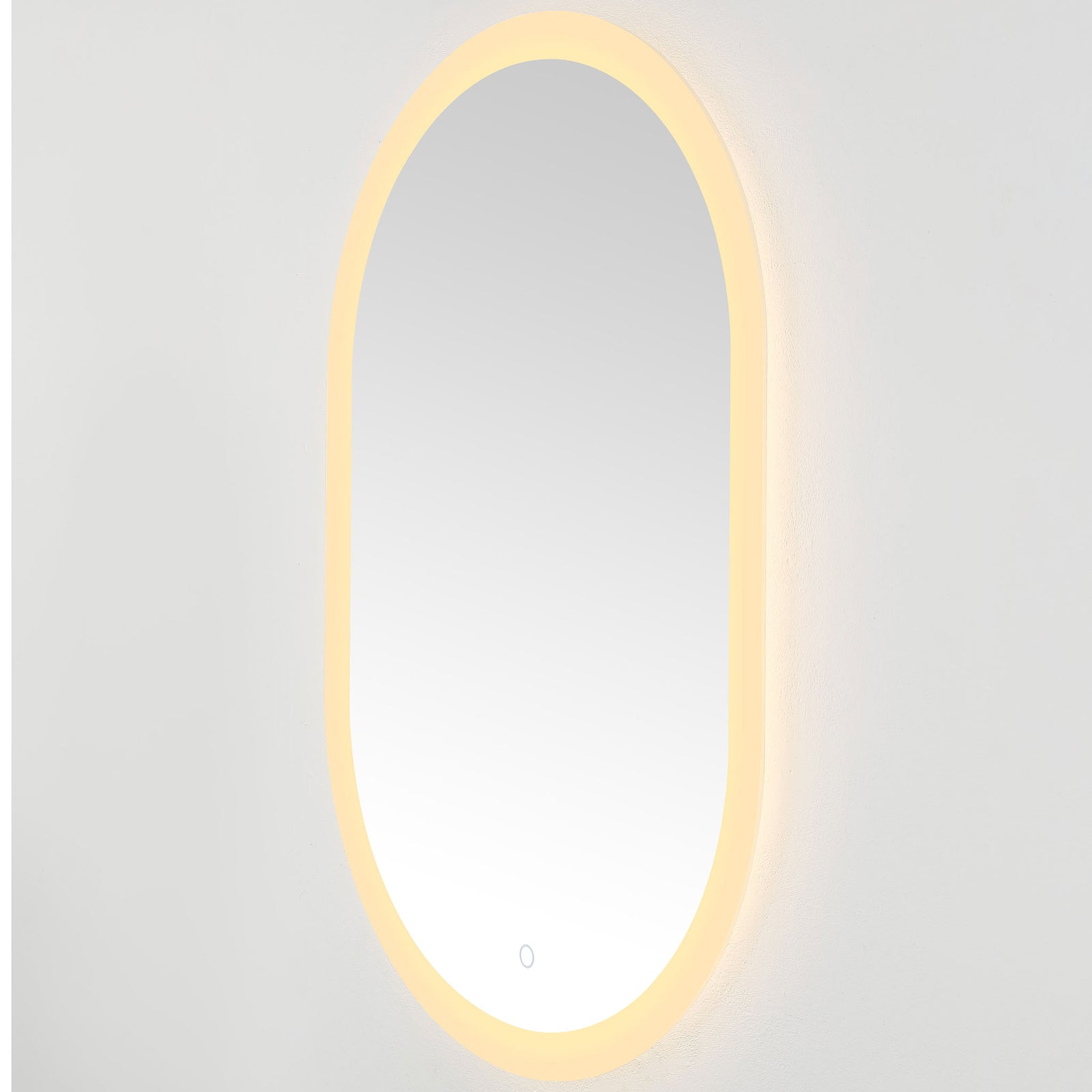 Warm golden LEDs surround the slim oval mirror and softly illuminate the wall || LMR1009A || front_angle_on_studio