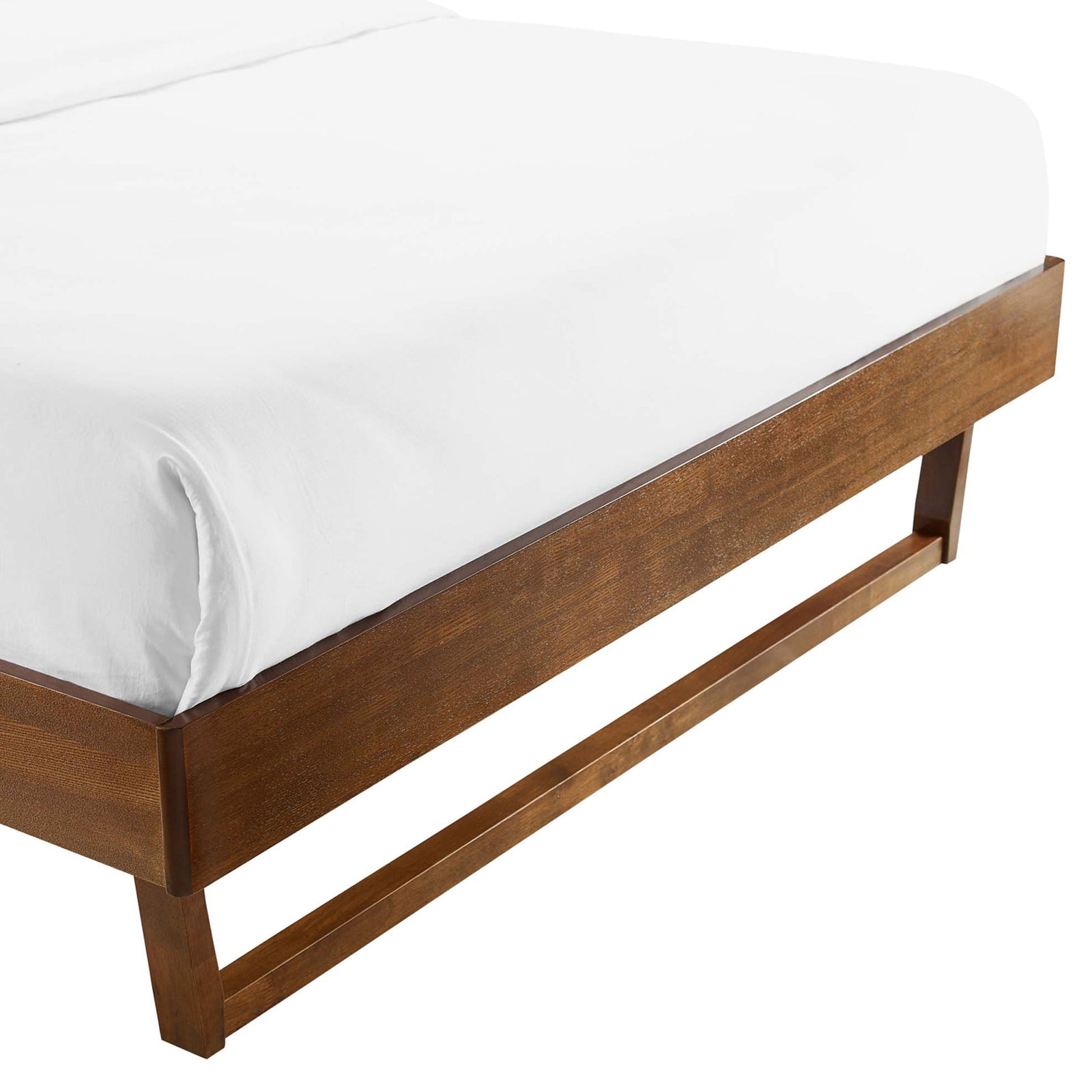 Walnut frame and angular sled legs highlight the smooth finish and craftsmanship || MOD-6214-WAL || leg_studio