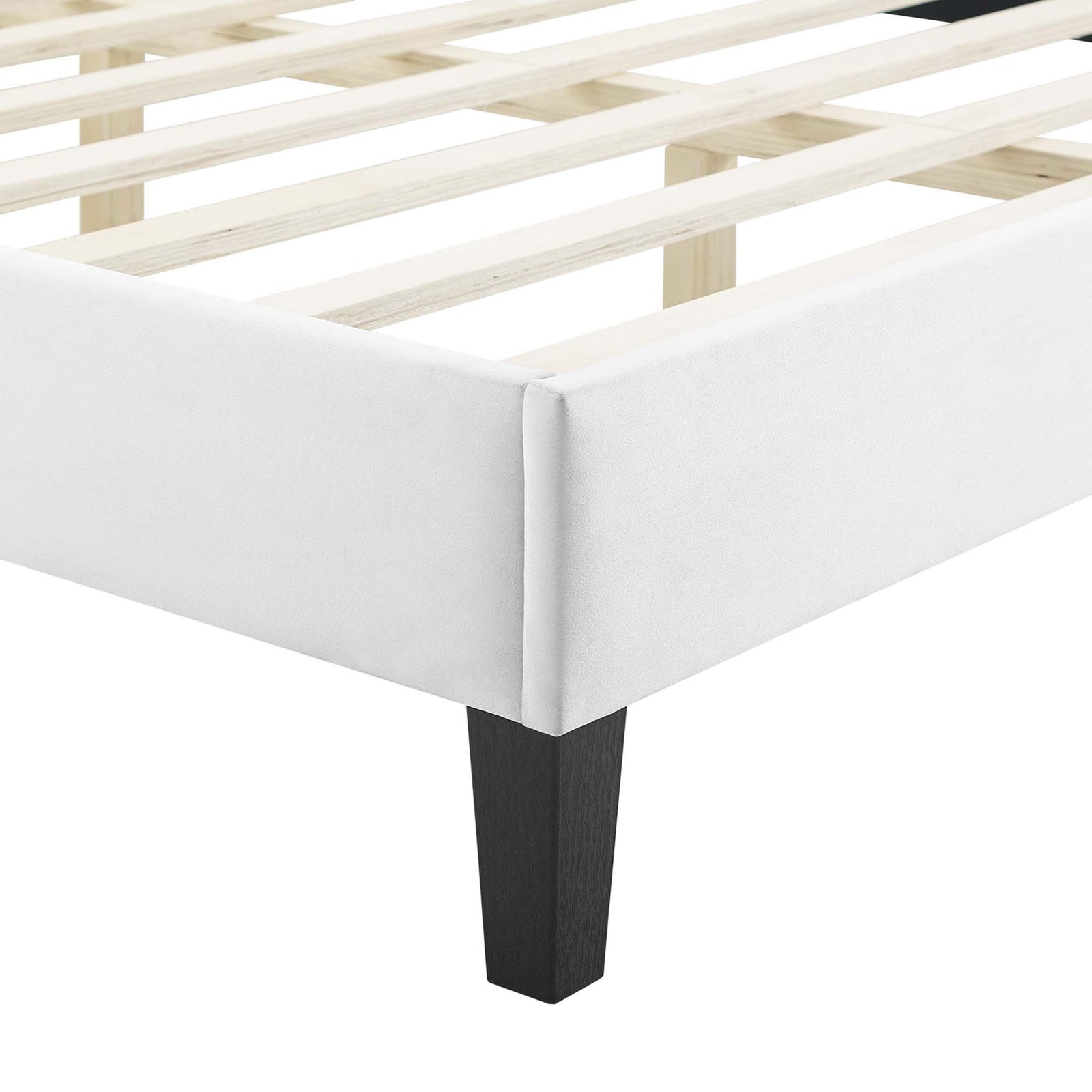 Black tapered leg and crisp, tailored white upholstered platform corner || MOD-6597-WHI || leg_studio