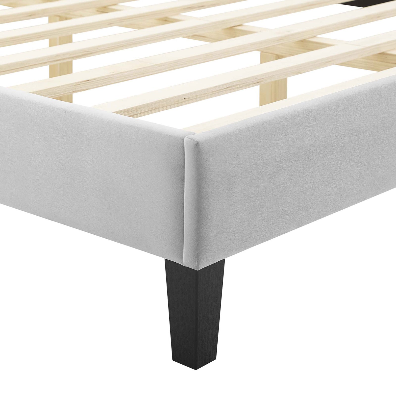 Upholstered corner with tapered black wood leg and clean piping detail || MOD-6735-LGR || leg_studio