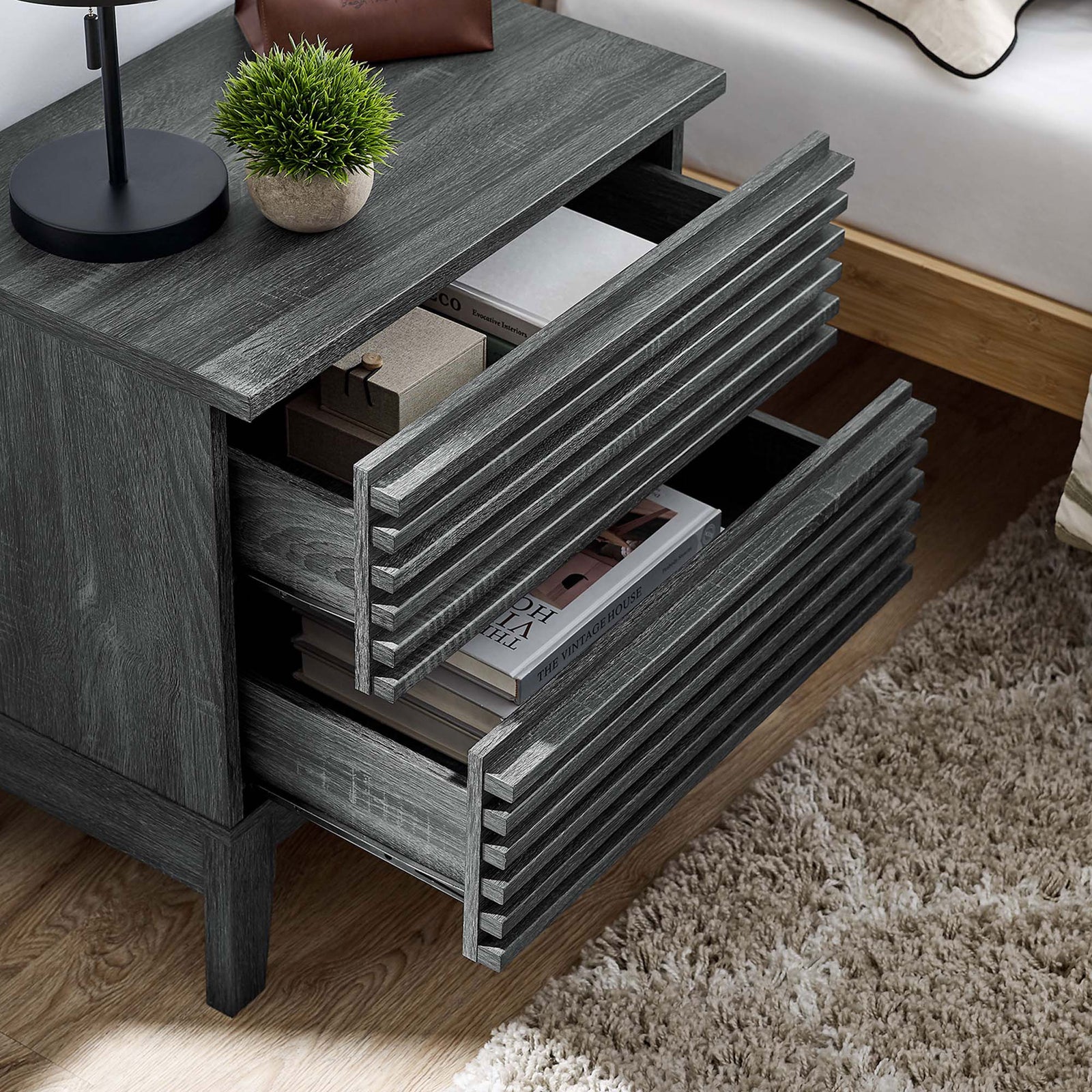 Nightstand styled beside a bed with both drawers open to show bedside storage capacity || MOD-6964-CHA || storage_open_room