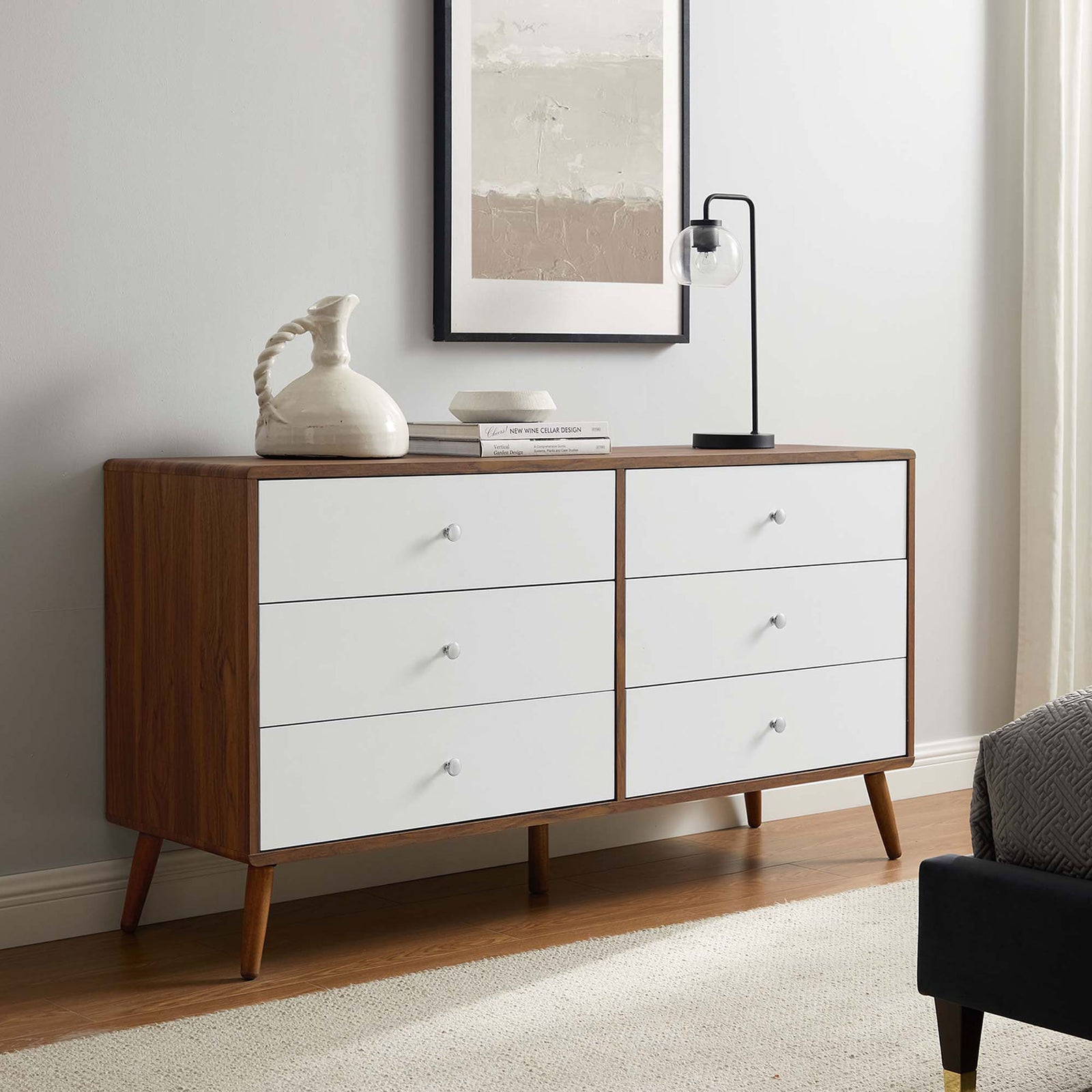 Wide walnut and white dresser styled with artwork and lighting in a contemporary bedroom. || MOD-7022-WAL-WHI || front_angle_room