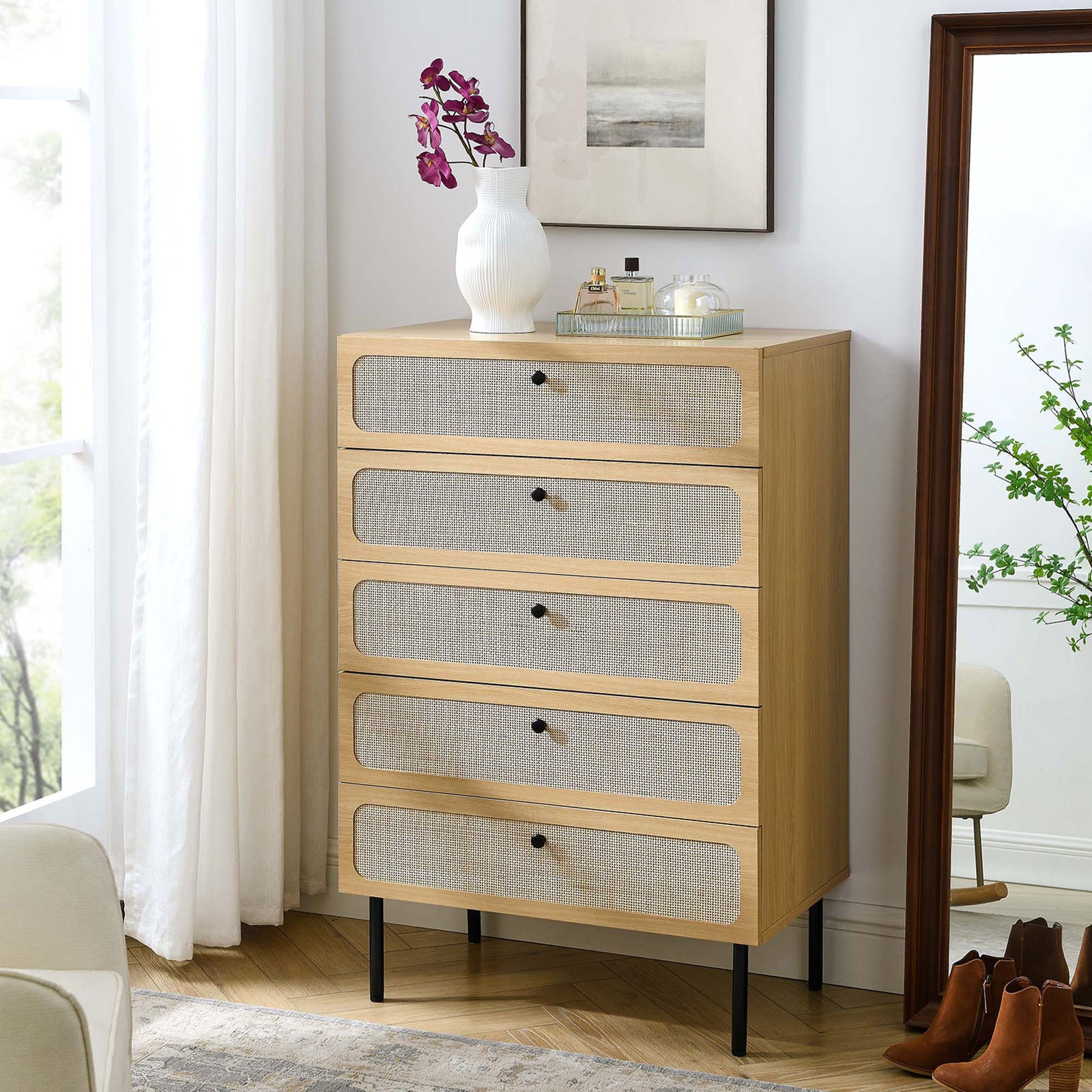Oak rattan-front chest styled with decor and mirror in a modern bedroom corner || MOD-7065-OAK || front_angle_room