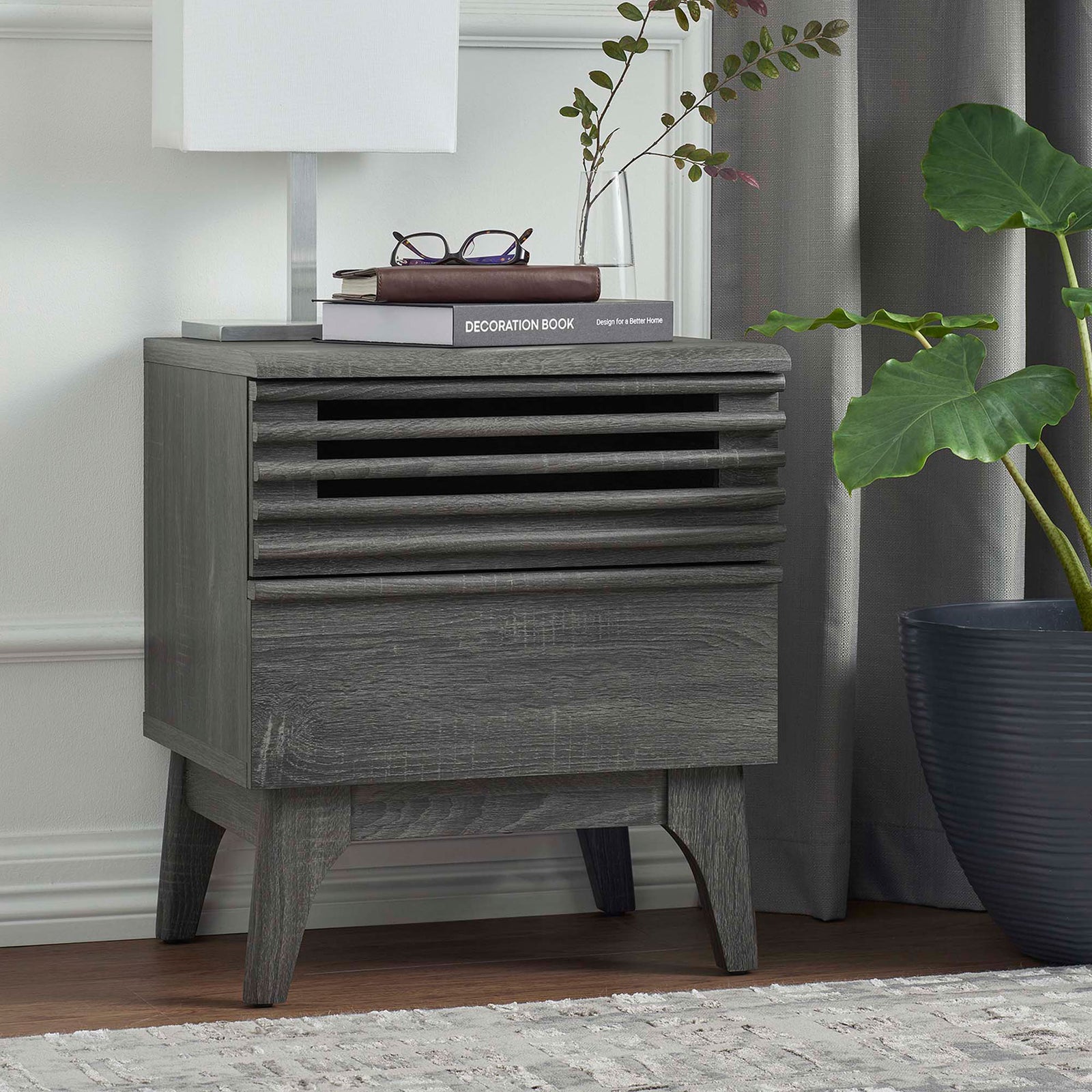 Charcoal nightstand styled in a cozy bedroom with books, lamp, and greenery for a warm modern look || MOD-7071-CHA || front_angle_room