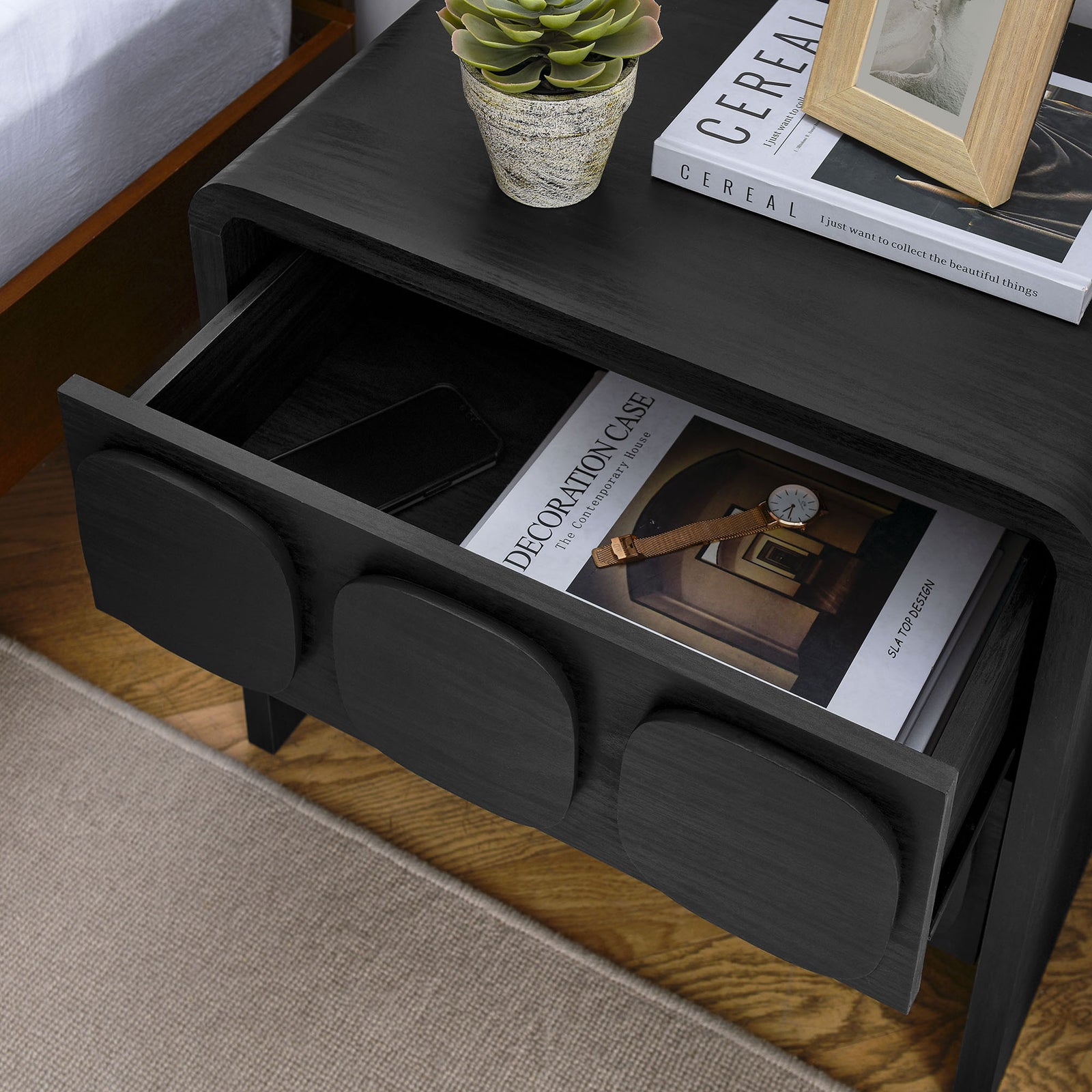 Nightstand drawer open and filled with books and decor, showcasing generous bedside storage space || MOD-7161-BLK || storage_open_room