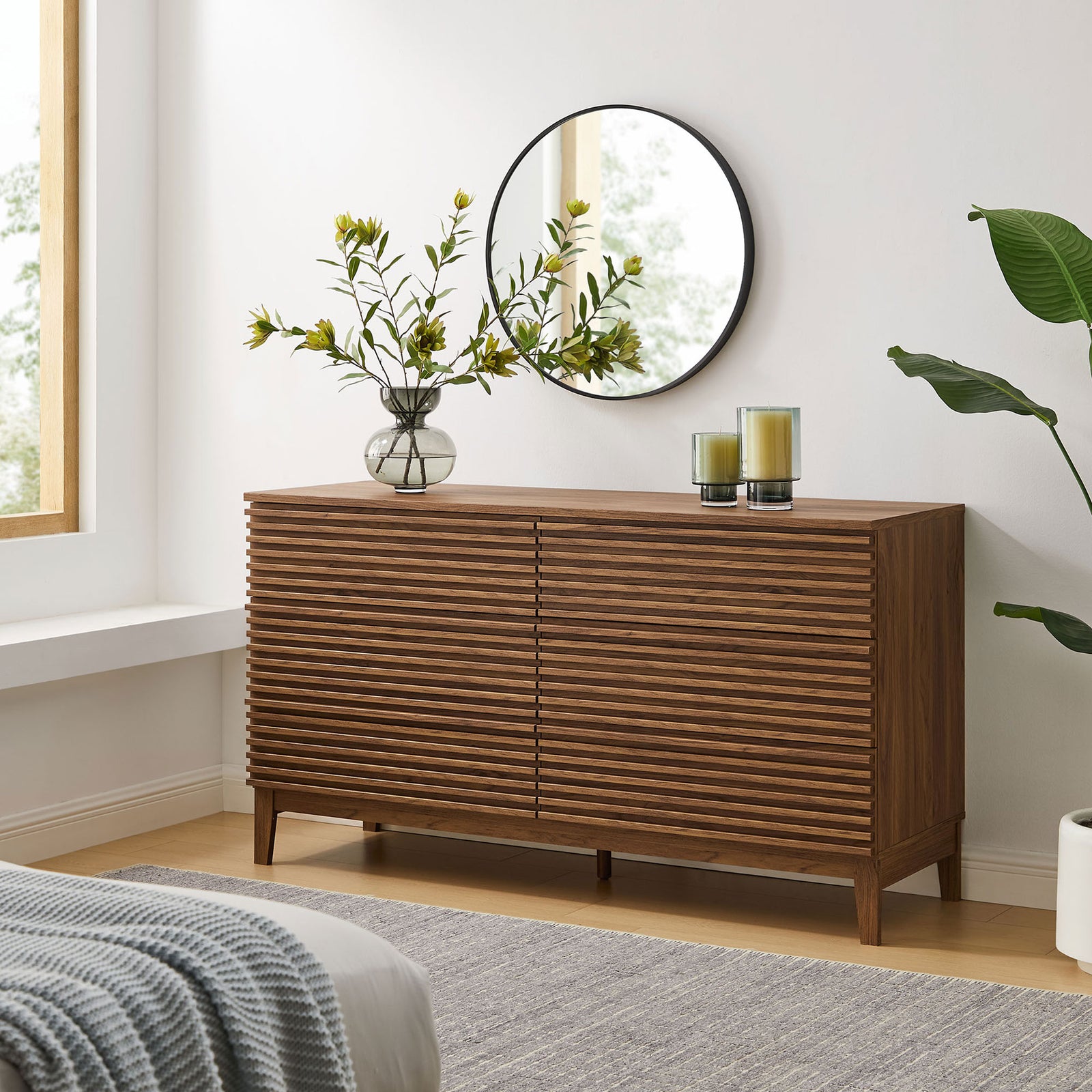 Slatted walnut dresser styled with decor accents brings warm texture to a modern bedroom. || MOD-7200-WAL || front_angle_room