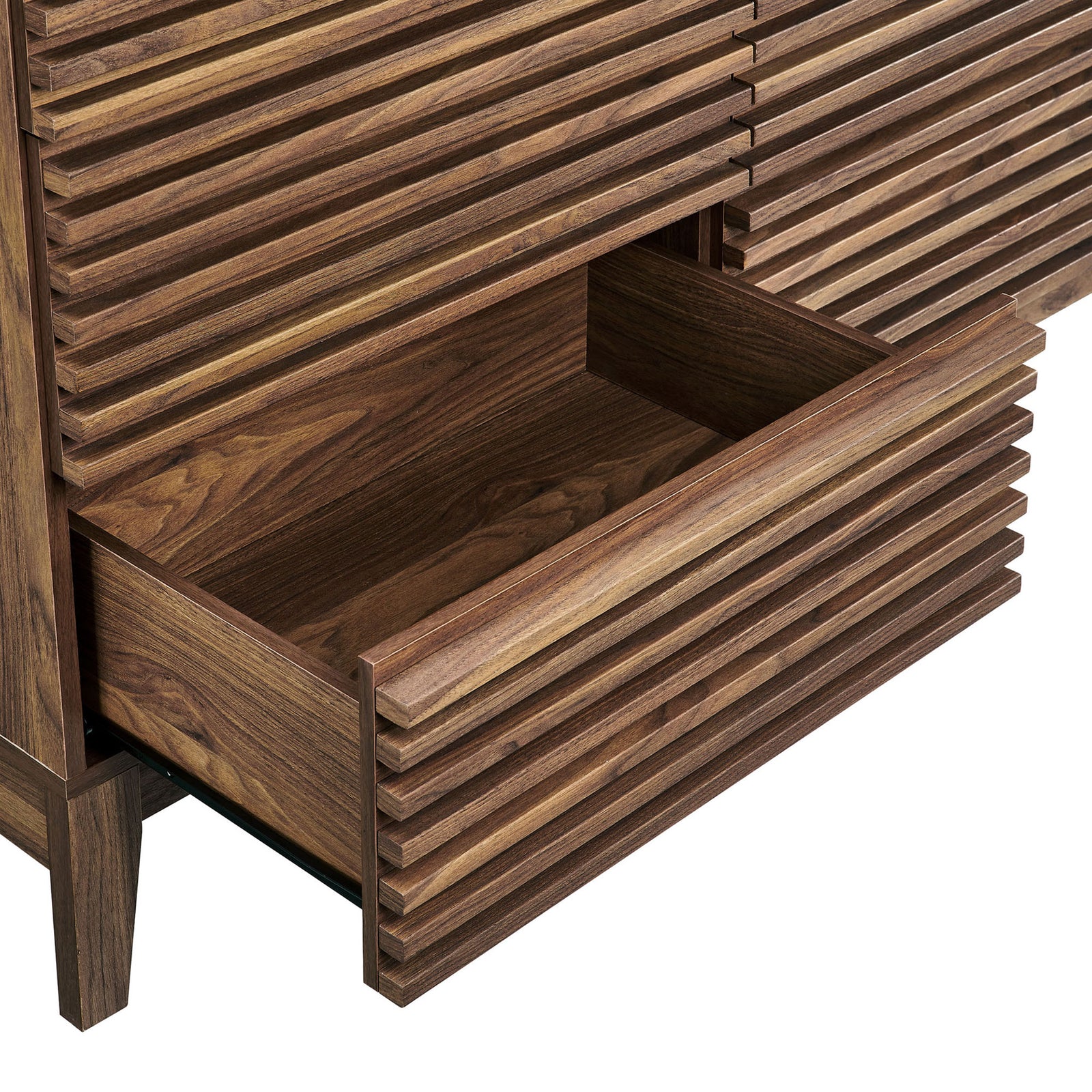 Full-extension drawer glides open to reveal spacious interior lined in warm walnut wood grain. || MOD-7204-WAL || storage_open_studio