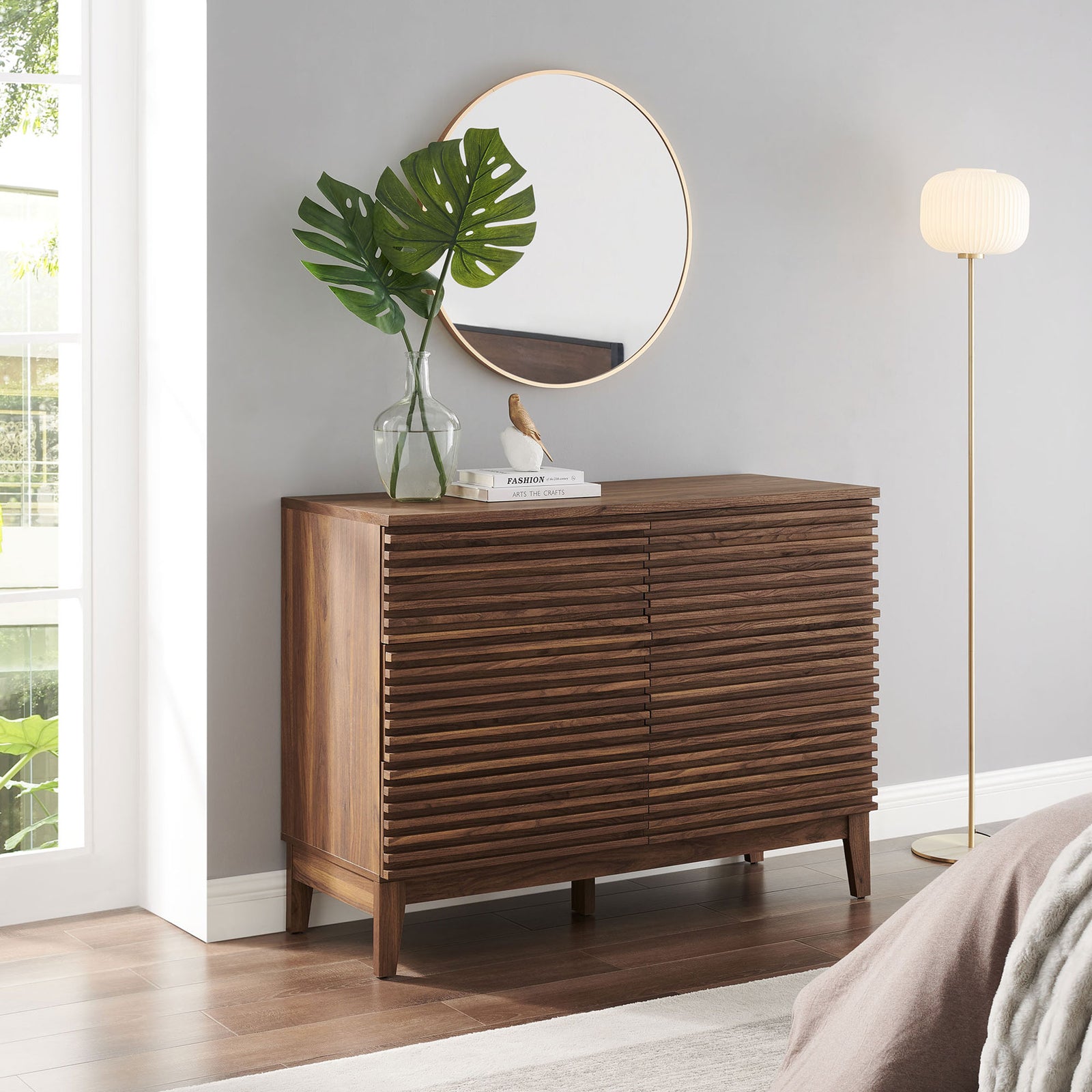 Slatted walnut dresser anchors a bright bedroom with modern decor and greenery. || MOD-7204-WAL || front_angle_room