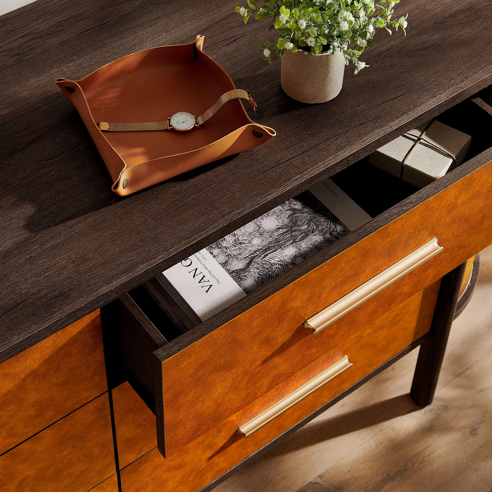 Styled dresser serves as storage and display, with a drawer slightly open to reveal everyday essentials. || MOD-7228-WAL-TAN || front_angle_open_room