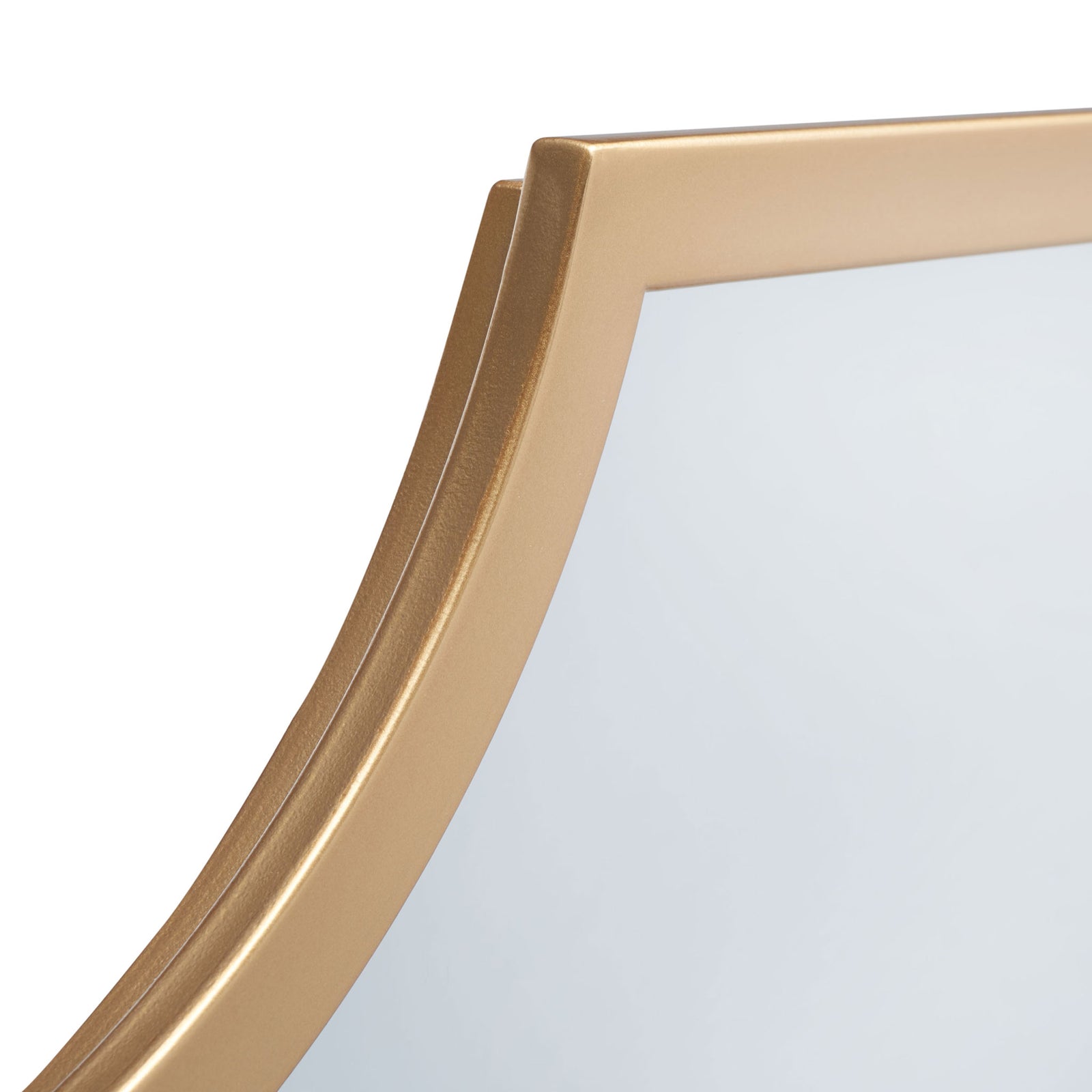 Warm brass-finished metal borders the mirror with a smooth, sculpted curve. || MRR2012A || detail_studio