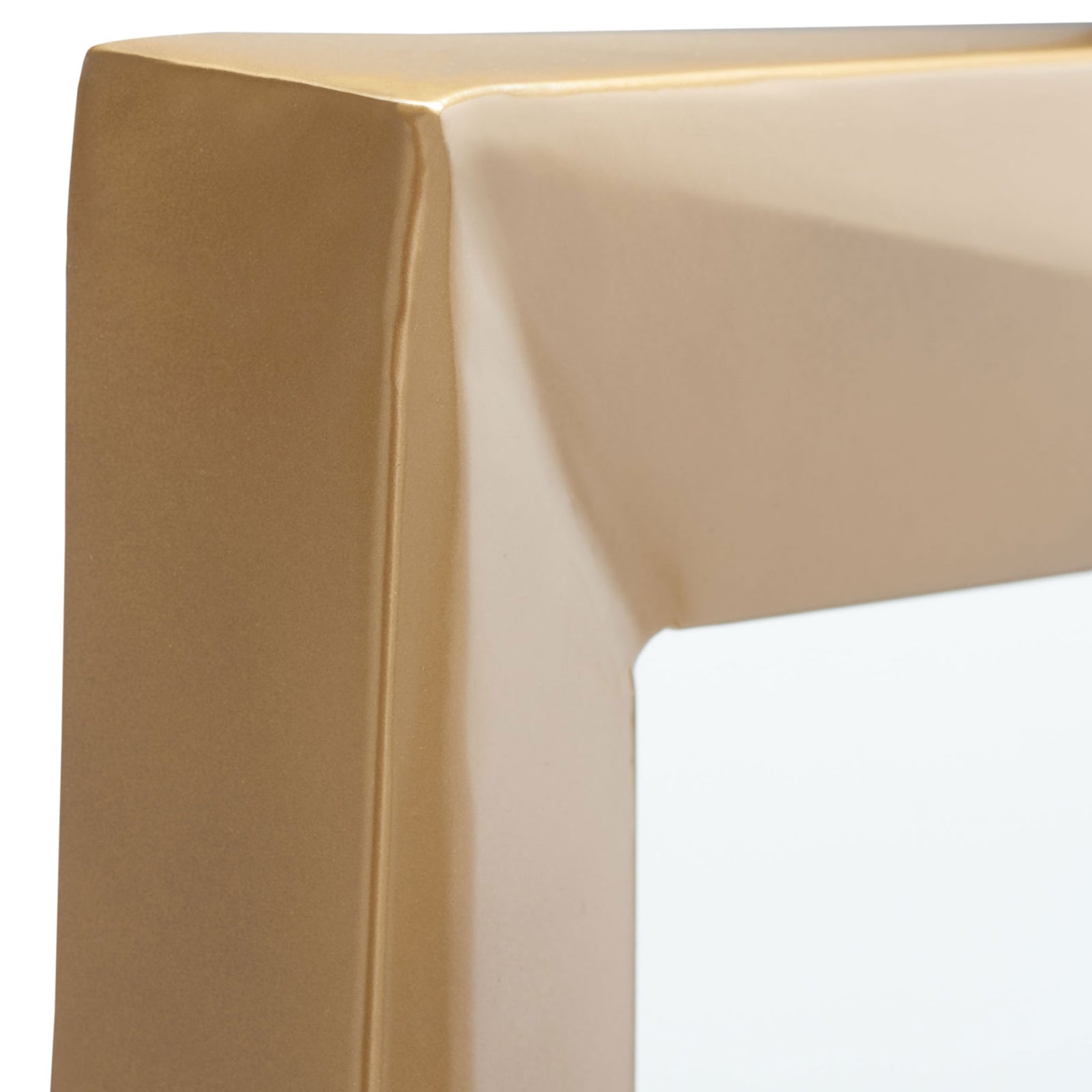 Gently folded corners give the lustrous brass-finished frame sculptural depth. || MRR3041A || detail_studio