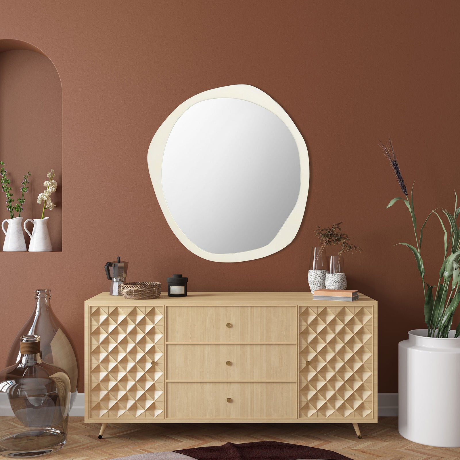 A sculpted ivory frame gives the softly rounded wall mirror an airy, organic look. || MRR3069A || front_room