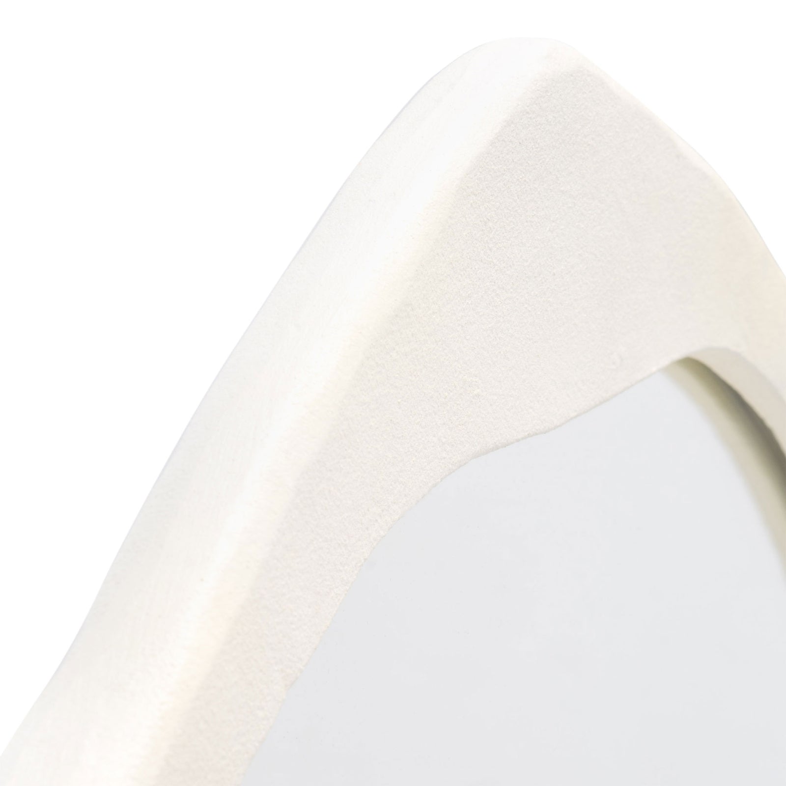 Subtly textured ivory frame curves around the reflective glass || MRR3070A || detail_studio