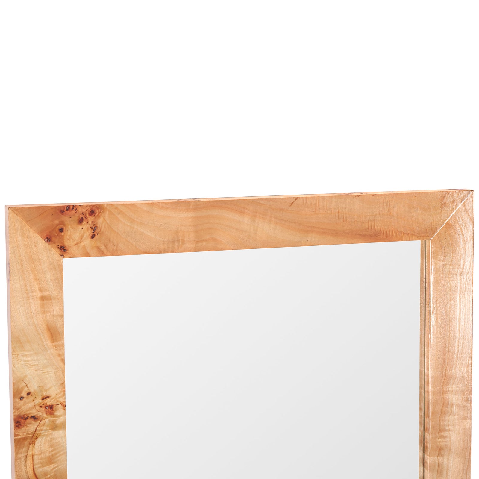 Light natural wood frame showcases flowing grain and knot clusters above the mirror glass. || MRR9014A || detail_studio