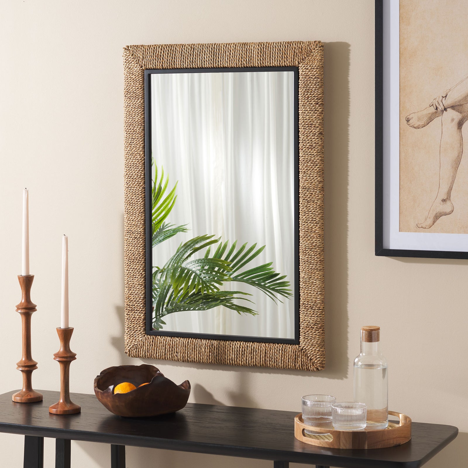 Woven rope and black trim bring natural texture to the wall above a sleek console. || MRR9017A || front_room