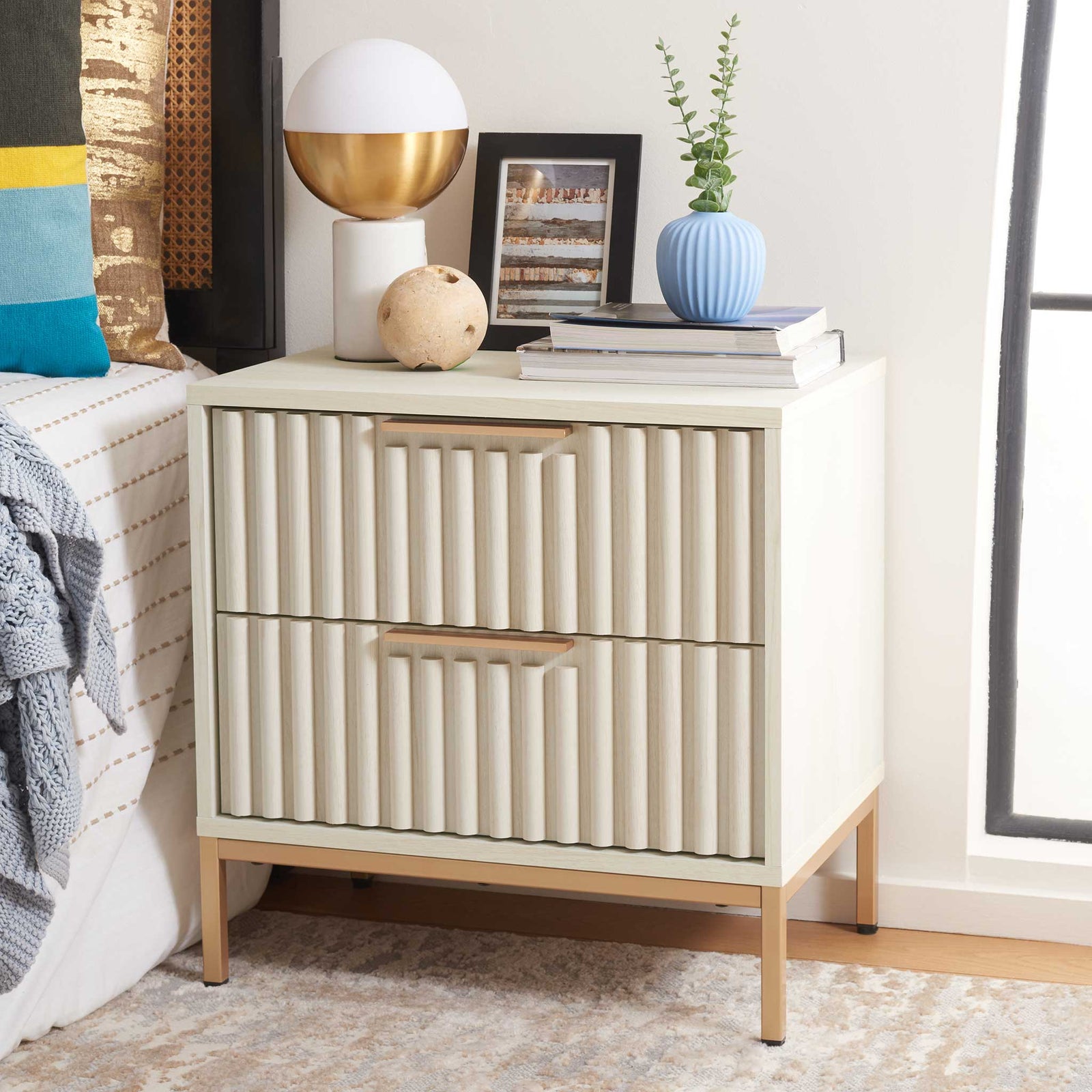 Modern nightstand elevates the bedside with fluted drawers and gold accents. || NST9605C || front_angle_room