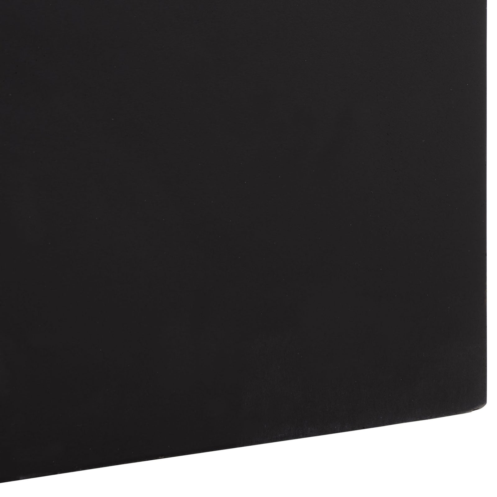Low, square black planter has a smooth finish reaching its grounded base || PAT1403A || leg_studio