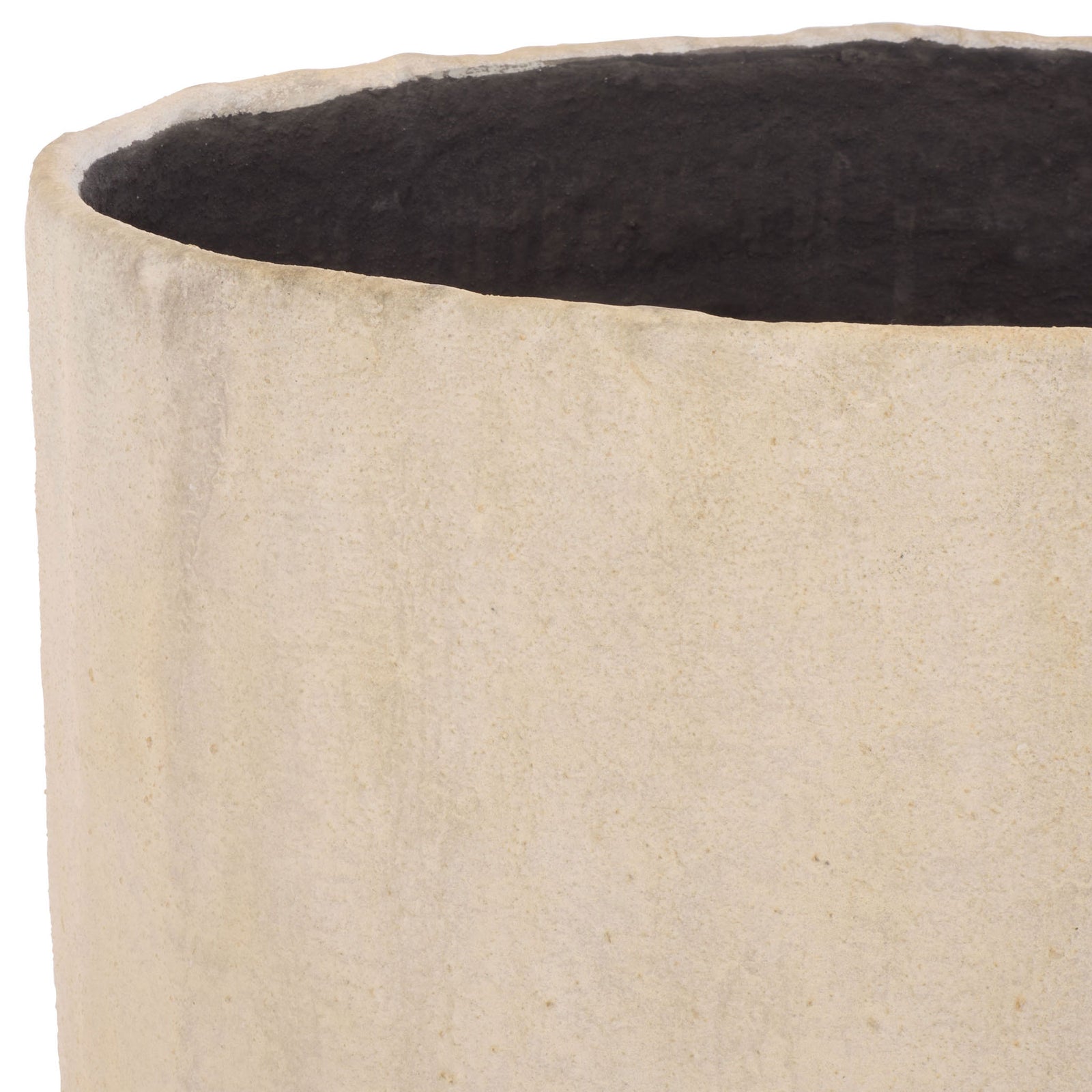 The large beige planter has a subtly textured rim and deep charcoal interior. || PAT1409B || detail_studio
