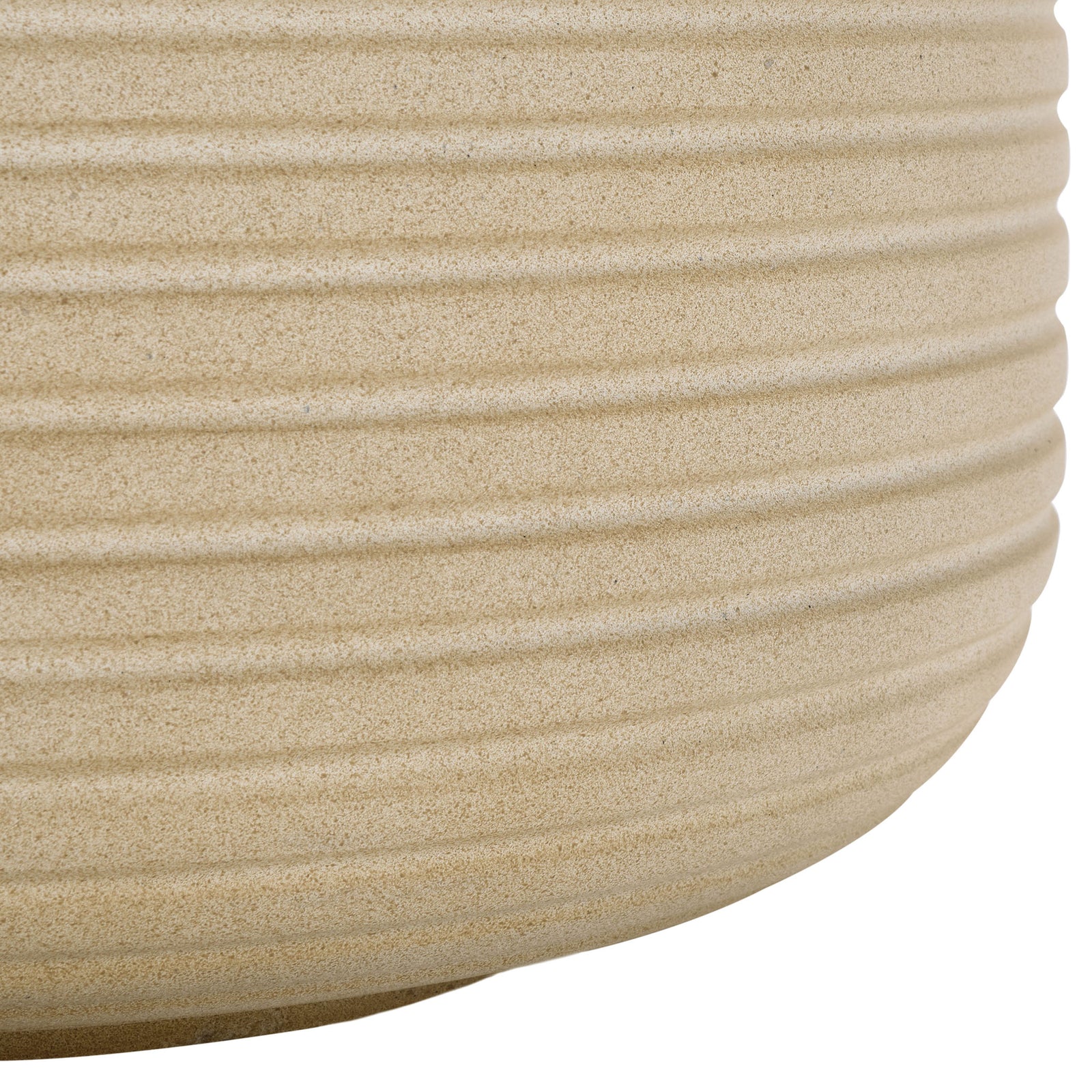 The beige planter's rounded base flows into its finely ribbed, sand-textured sides || PAT1530B-SET2 || leg_studio