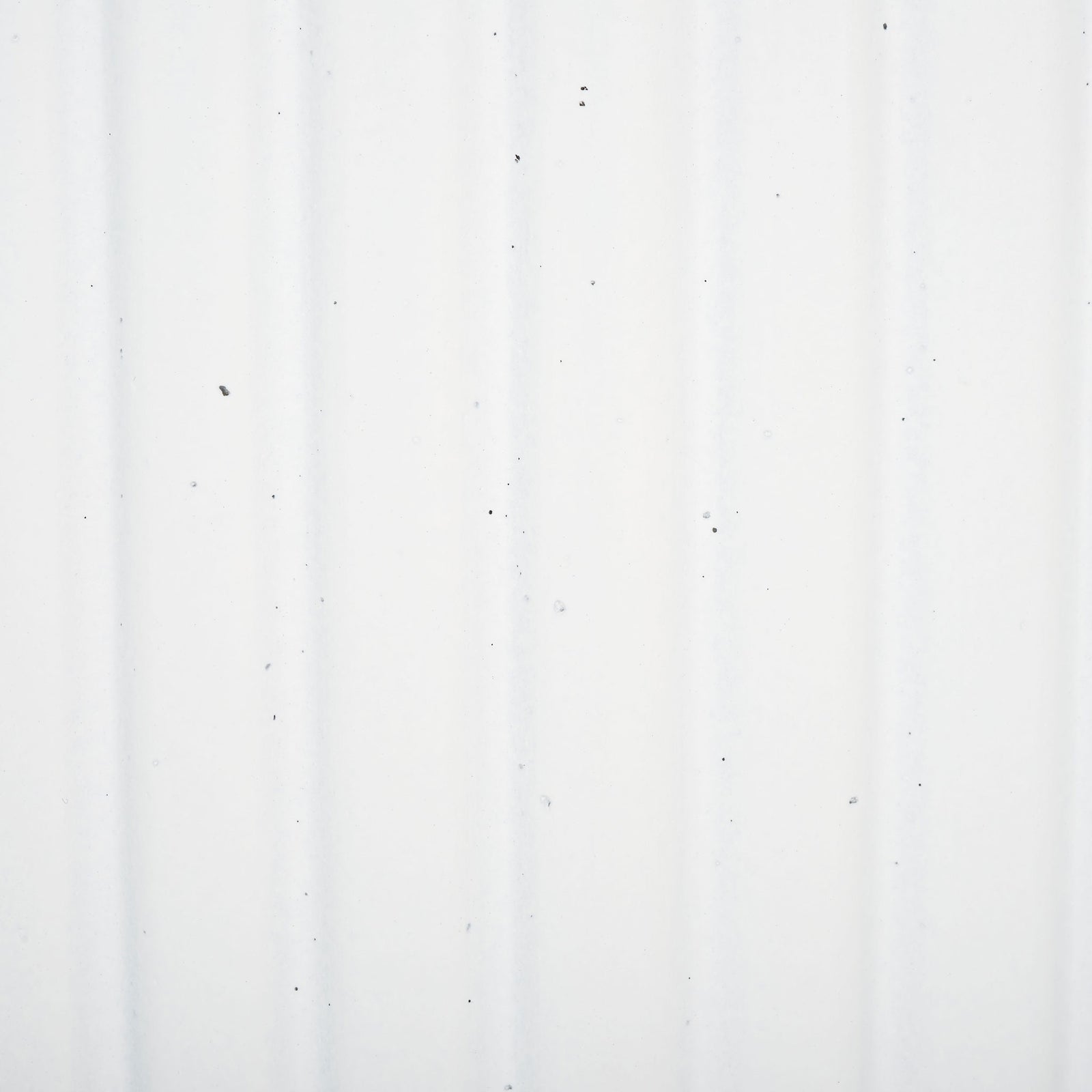 Tiny dark flecks punctuate a white finish shaped by delicate vertical flutes. || PAT1532C-SET2 || swatch_studio