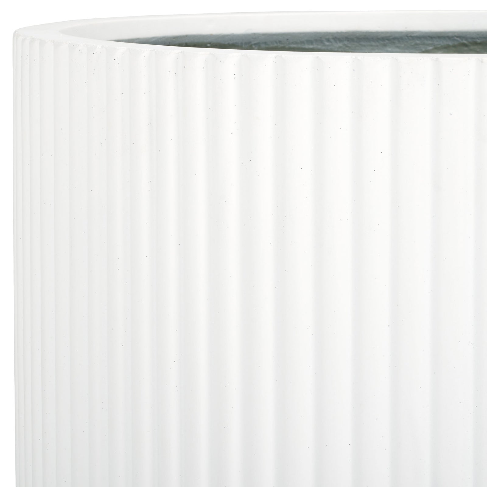 A clean white rim meets slim fluted sides and a contrasting charcoal-gray interior. || PAT1533C || detail_studio