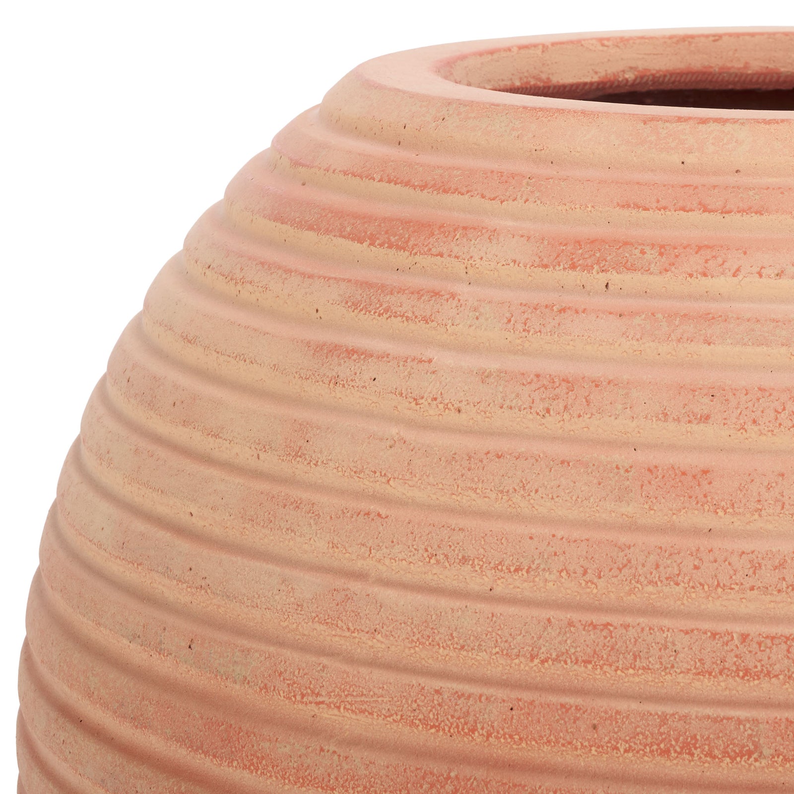 Terracotta planter has a sturdy rounded lip and sandy orange ridges. || PAT1534D || detail_studio