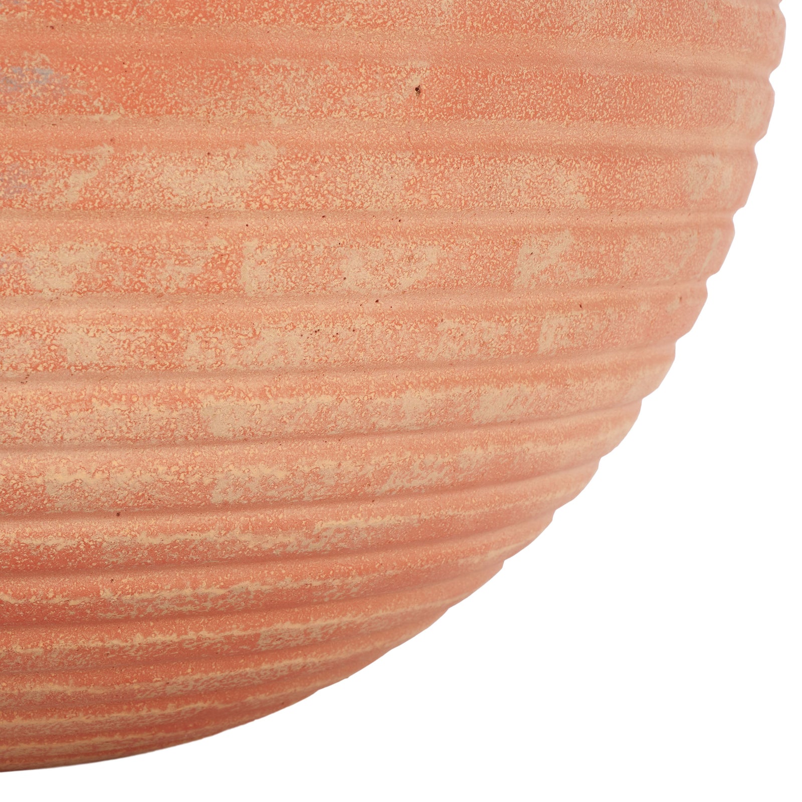 Warm terracotta ribs follow the planter's inward curve down to its rounded base. || PAT1534D || leg_studio