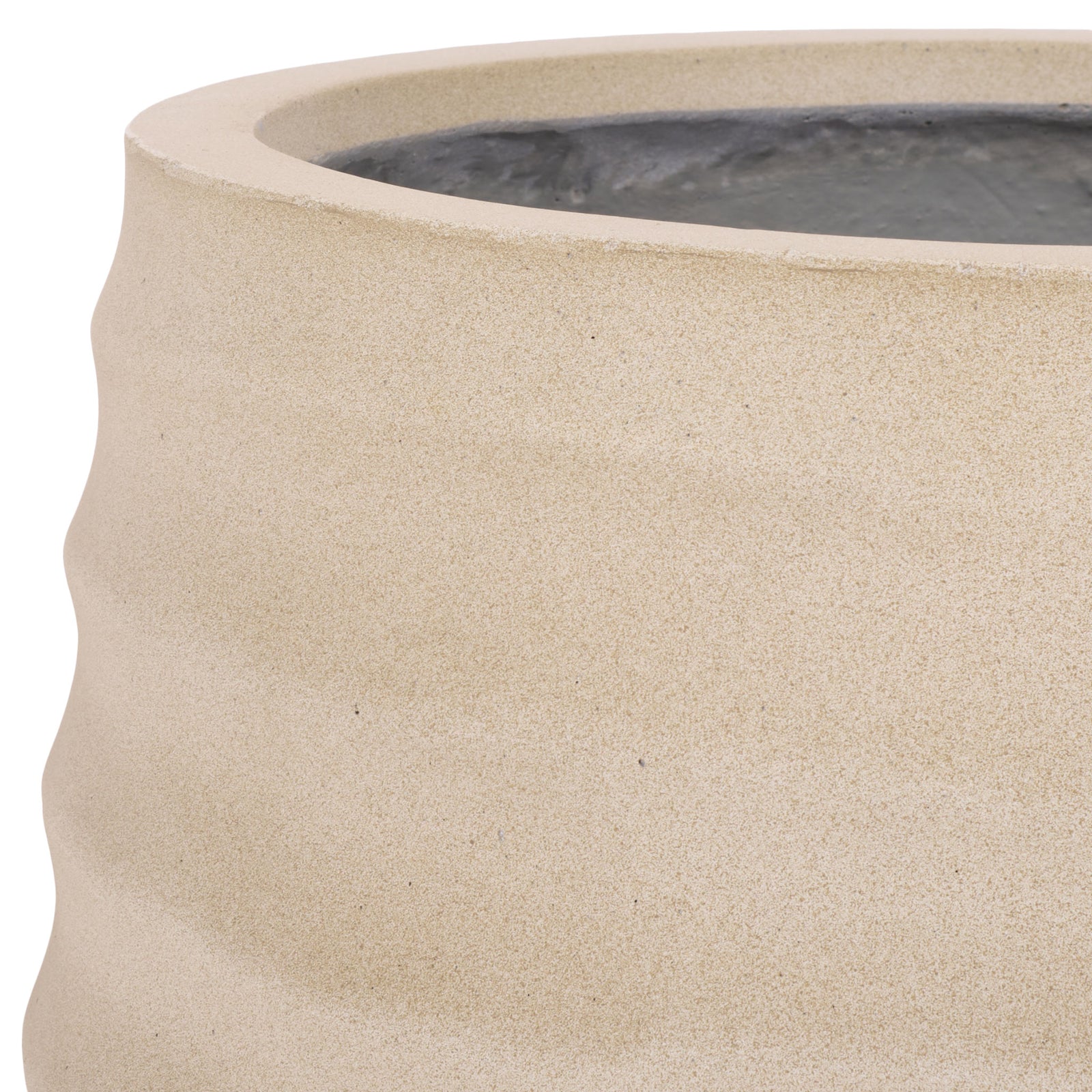A finely textured beige finish softens the planter's sculpted ridges. || PAT1542B || detail_studio