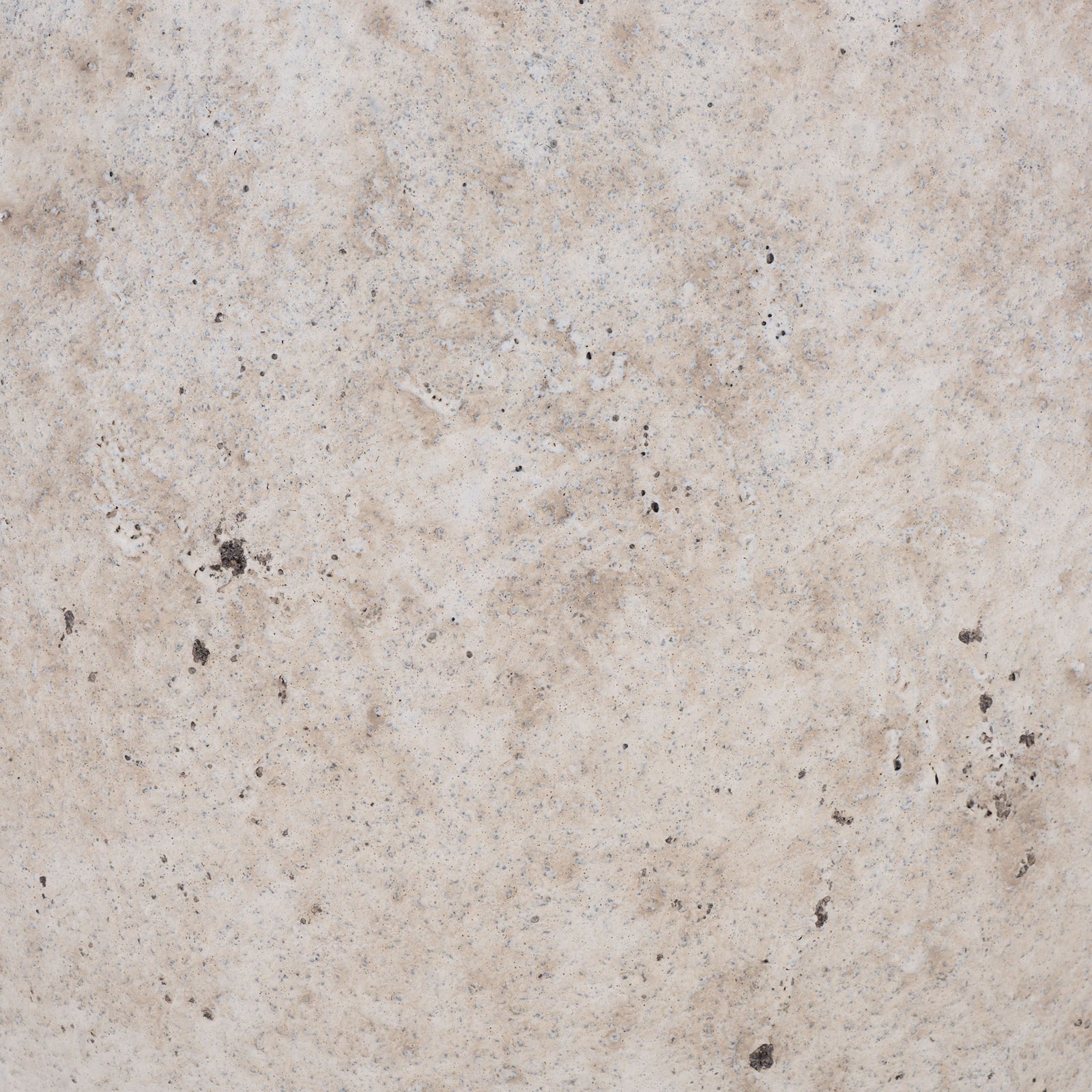 The antique white ficonstone finish blends creamy mottling with scattered dark specks. || PAT1549B || swatch_studio