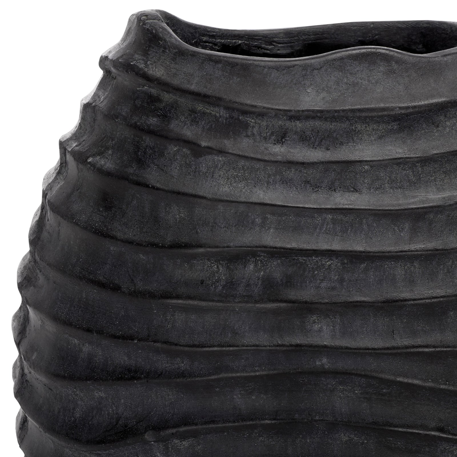 An irregular rim meets pronounced waves in the planter's subtly weathered black finish || PAT5043E || detail_studio