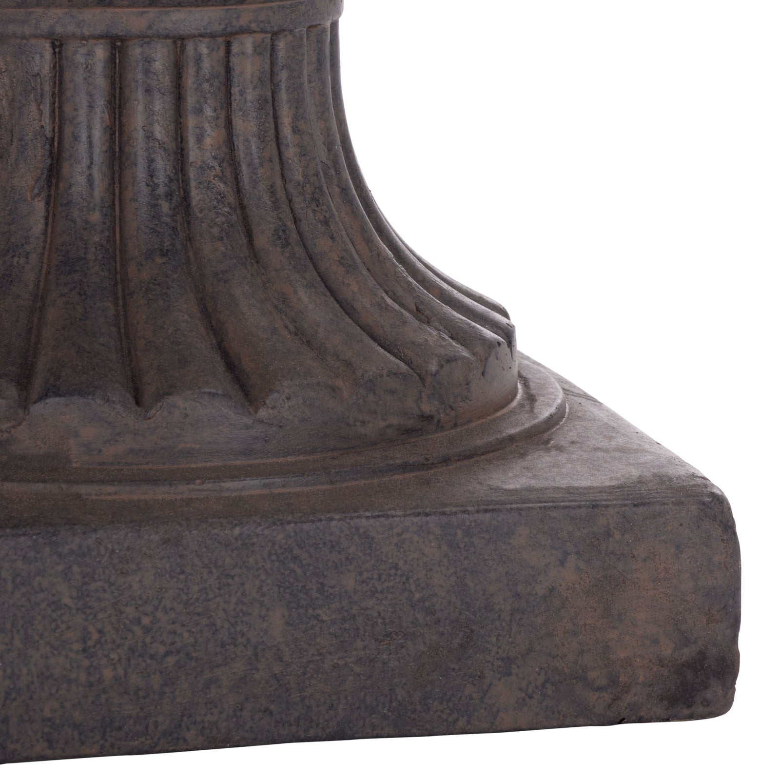 The brown planter rests on a square base, with ribbed contours climbing its sculpted pedestal. || PAT5045B || leg_studio