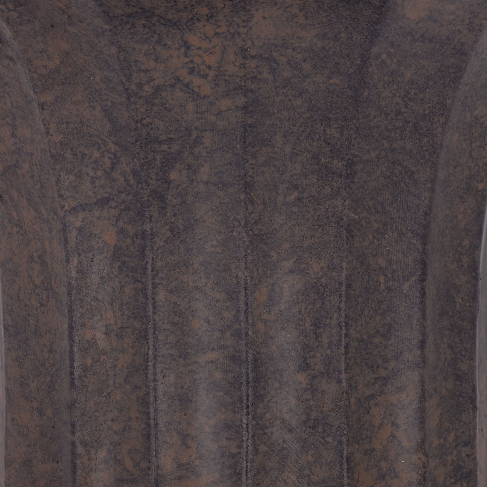 Warm brown highlights soften the dark, mottled finish of the planter's fluted surface. || PAT5045B || swatch_studio